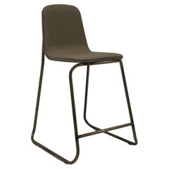 Counter chairs by Jacob Nitz for Bogaerts. Bronze look base with light brown uph