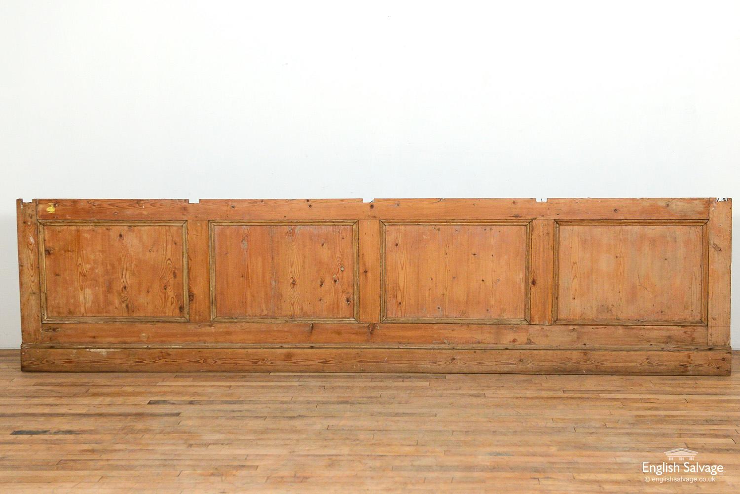 Reclaimed 19th century pine shop counter front. Fielded panels measure 44cm high and 65cm high. The addition of skirting could be added if more height was required to make a bar front etc.