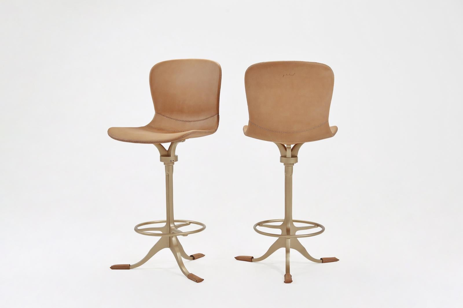 Model: PT473 Counter-height chair + Swivel + footrest ring
Seat: Leather
Seat color: Marron glacé (Light Brown)
Base: PT473 sand cast brass
Base finish: Golden sand
Dimensions: 43 x 52 x 99 (seat height 65 cm)
(W x D x H) 16.9 x 20.5 x 39 inch (seat