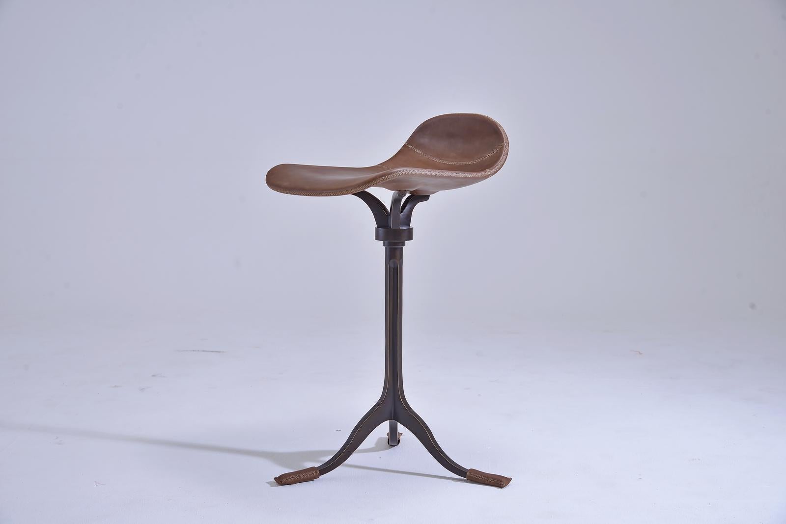 Model: PT48 counter-height and swivel stool
Seat: Leather
Seat color: Truffe
Base: PT48 base, with swivels and hand cast brass
Base finish: Brushed brown
Dimensions: 52 x 50 x 78 cm (seat height 66 cm)
(W x D x H) 20.5 x 21.7 x 30.7 inch (seat