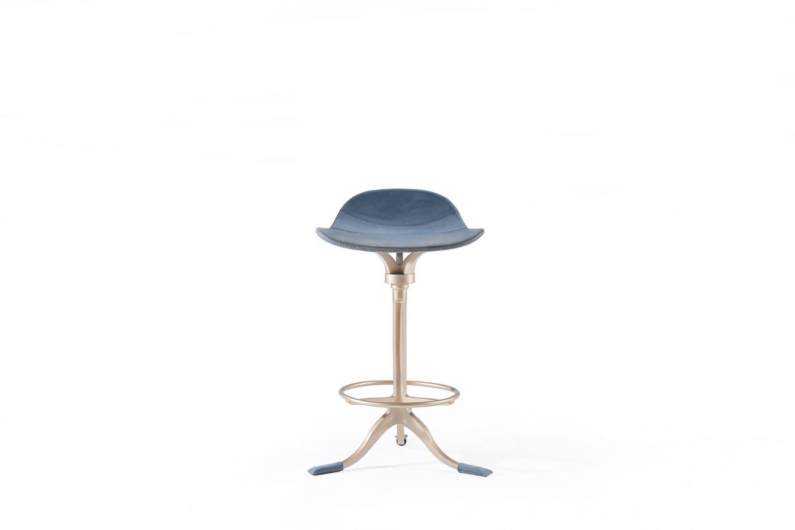 Model: PT483 counter-height stool + swivel + footrest ring
Seat: leather
Seat color: Paris Plage (Blue)
Base: PT483 sand cast brass
Base finish: Golden sand
Dimensions: W 43 x D 52 x H 78 (seat height 65 cm)
W 16.92 x D 20.27 x H 30.71 (seat height