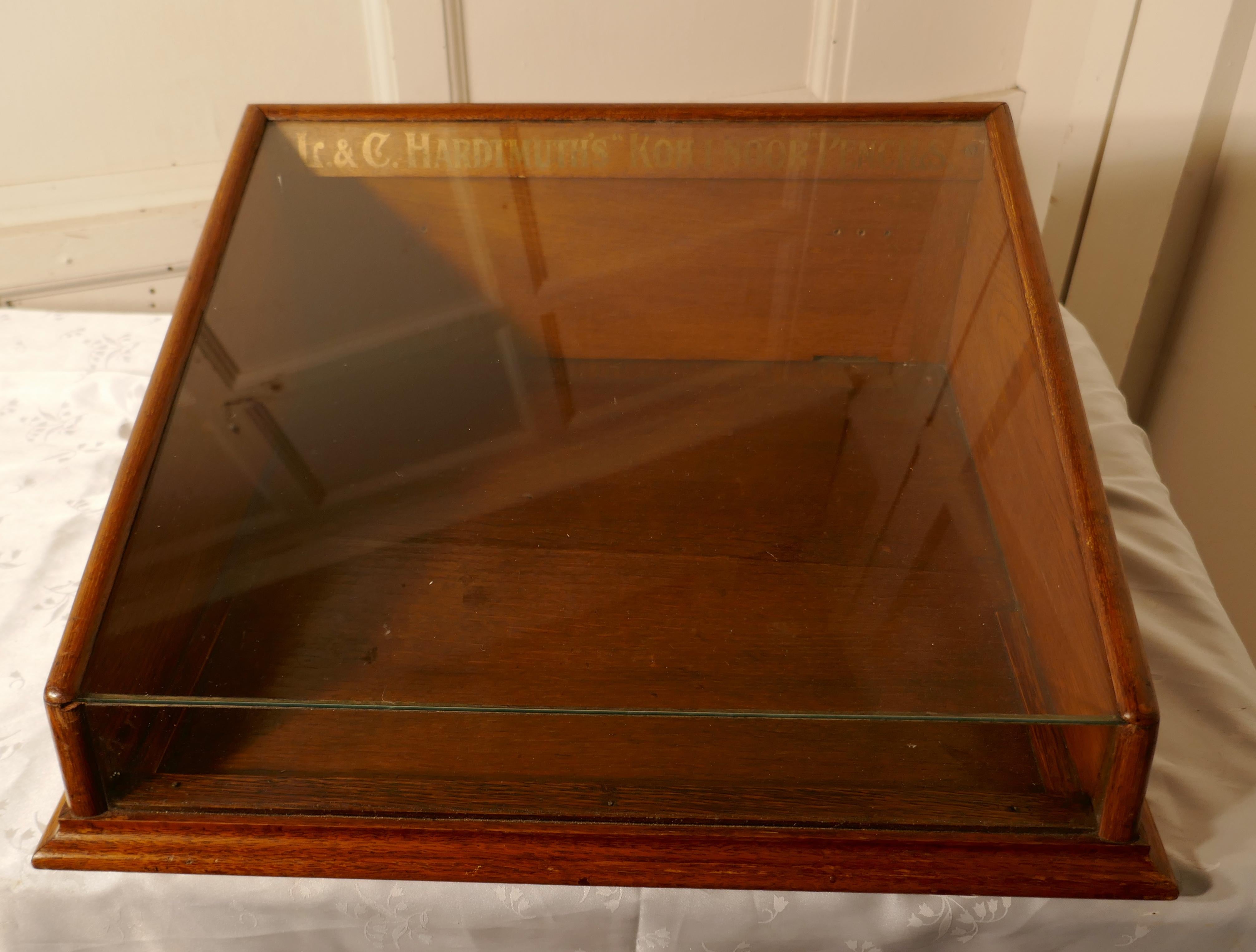 Counter top Display Cabinet for L & C HARDMUTH’S “KOH-I NOOR” Pencils

A Great little display cabinet made in Golden Oak dating back to the end of the 19th Century, the cabinet has glass sloping top, it opens at the back and had a pink velvet