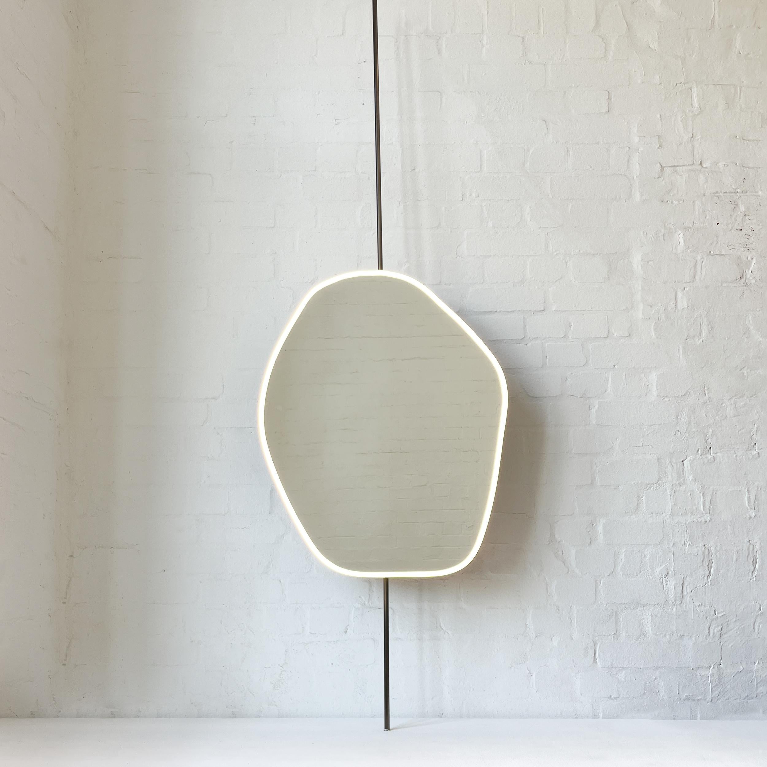 Patinated Countertop to Ceiling Freeform Illuminated Mirror with Bronze Patina Brass Frame For Sale