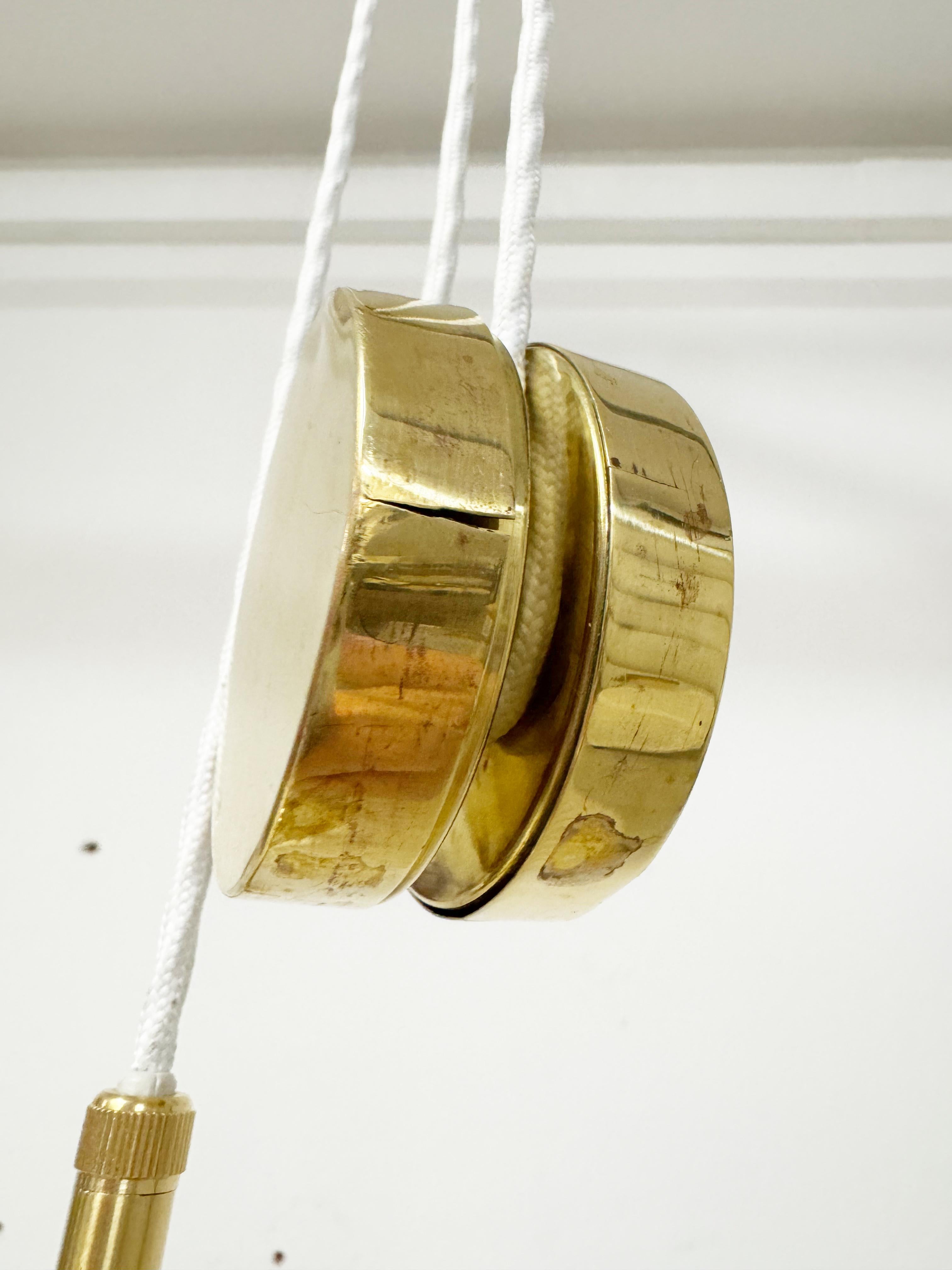 Lampada a sospensione regolabile a contrappeso 