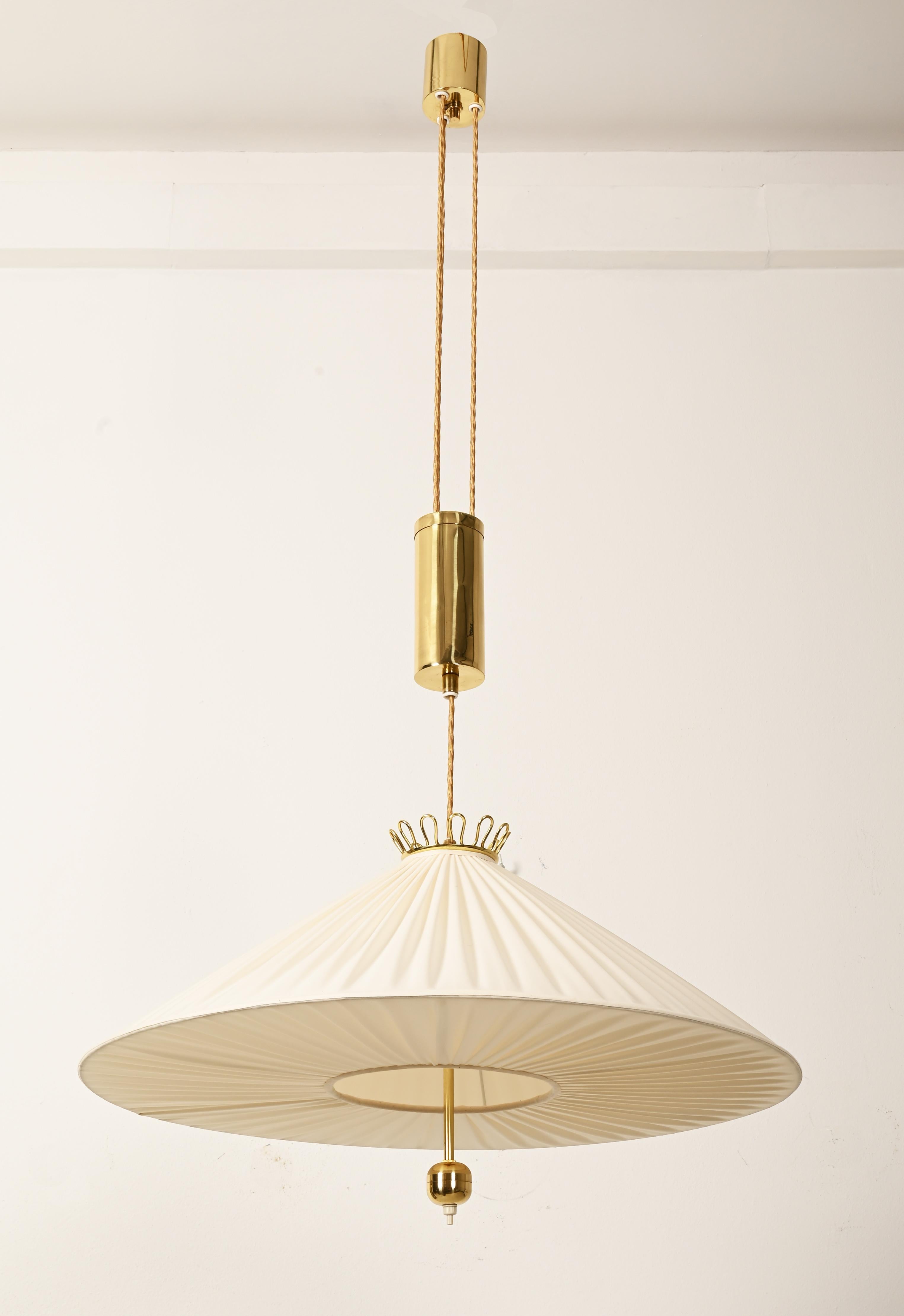 Large height adjustable brass counter balance pendant. Design attributed to Josef Frank manufactured in the 1930s and  Fitted with three E27 sockets. The lamp is fully restored with new electric.
 