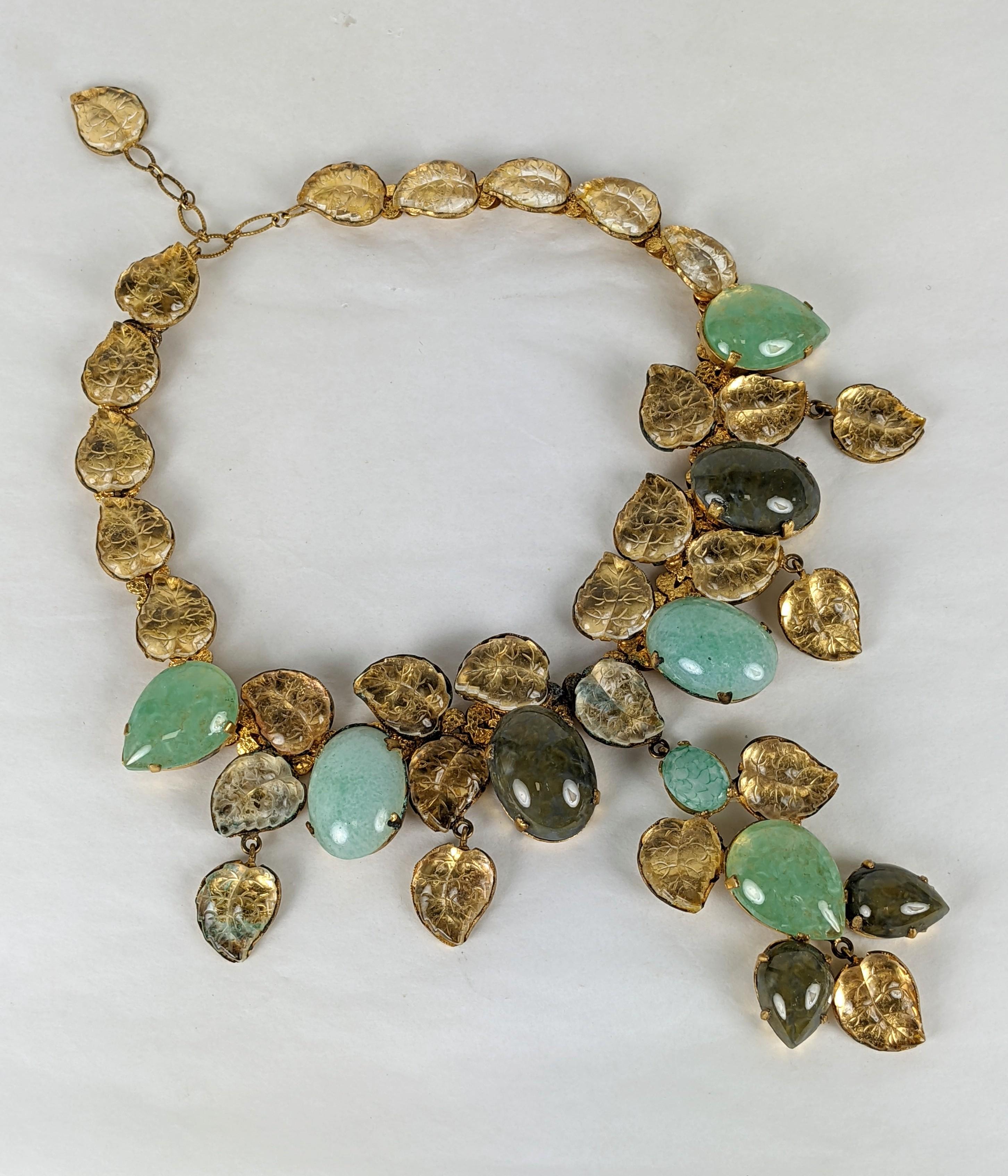 Massive and important Countess Cis Mughal bib necklace from France, 1950s. Composed of signature molded and carved fruit salad and Gripoix glass cabocheons in citrine and faux jade. Very Good Condition. Unsigned. France 1950's. 
Length 14