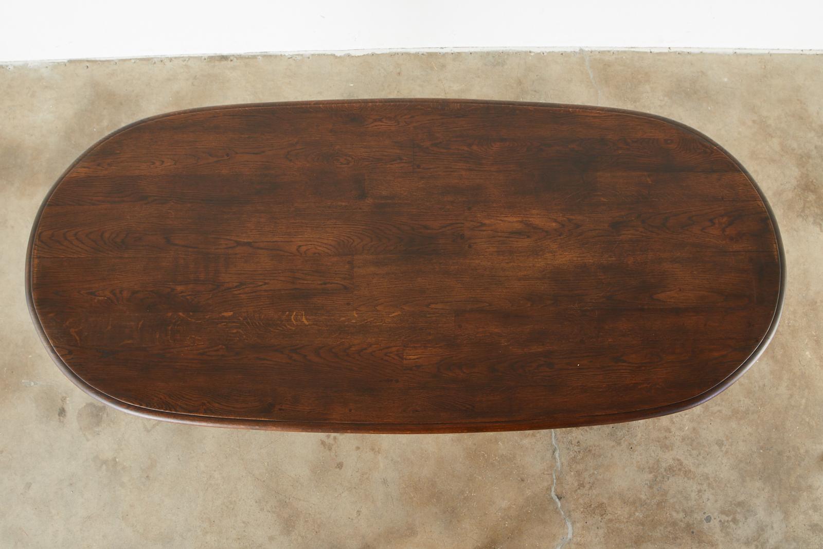 20th Century Country English Oak Oval Trestle Dining Table