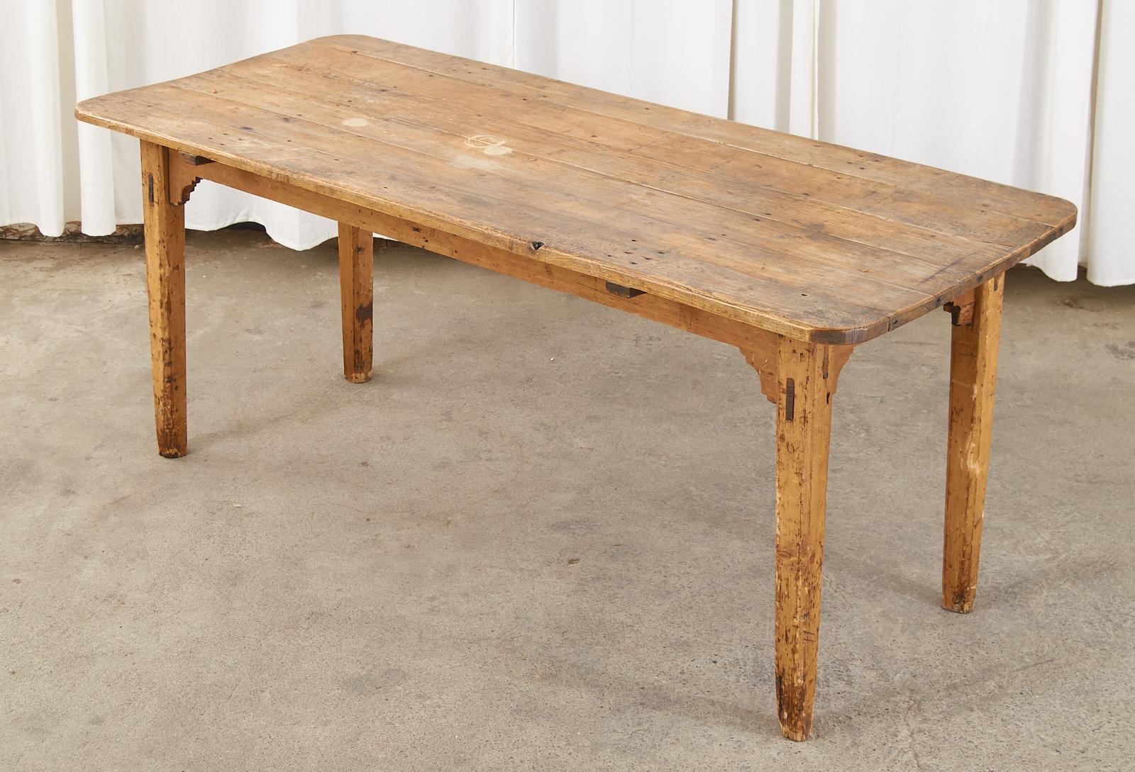 Country English Provincial Fruitwood Farmhouse Dining Table In Distressed Condition In Rio Vista, CA