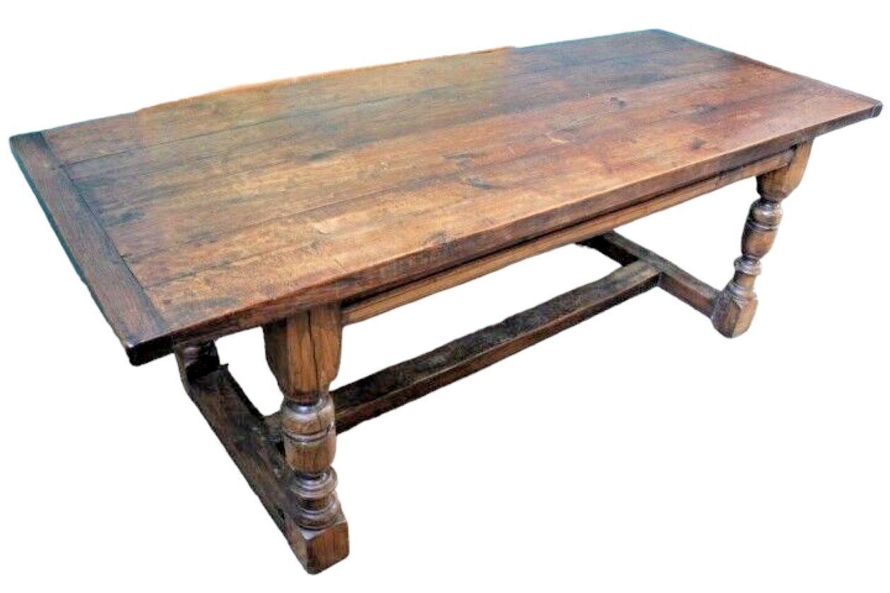 A characterful English table 
Proper peg joined Oak refectory table  
Good thick three plank top with cleated ends set on turned baluster legs 
Character timbers throughout
Natural finish
Seats 8
7' Long 

Classic English oak refectory dining tables