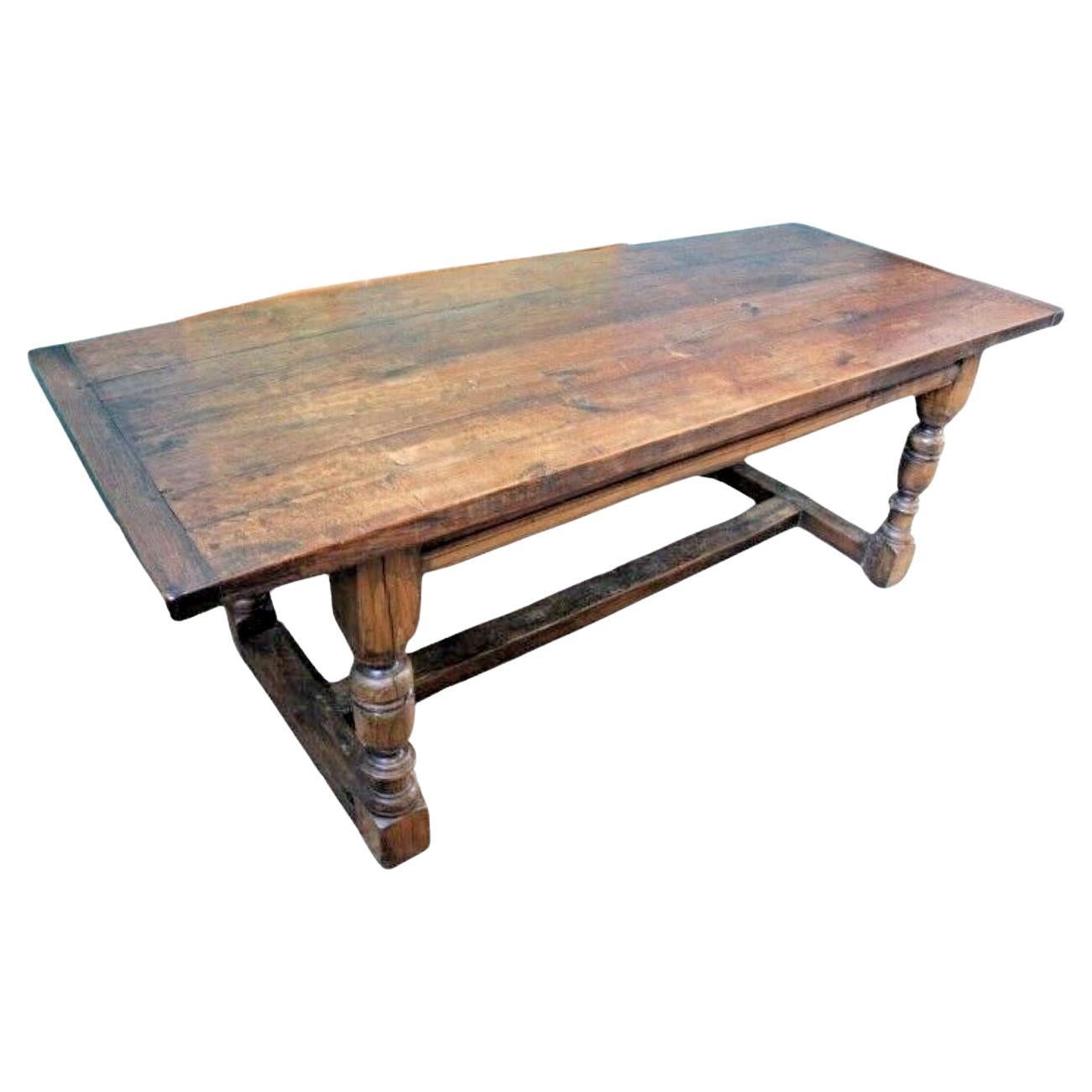 A characterful English table
Proper peg joined Oak refectory table
Good thick three plank top with cleated ends set on turned baluster legs
Character timbers throughout
Natural finish
Seats 8
7' Long

Classic English oak refectory dining tables were