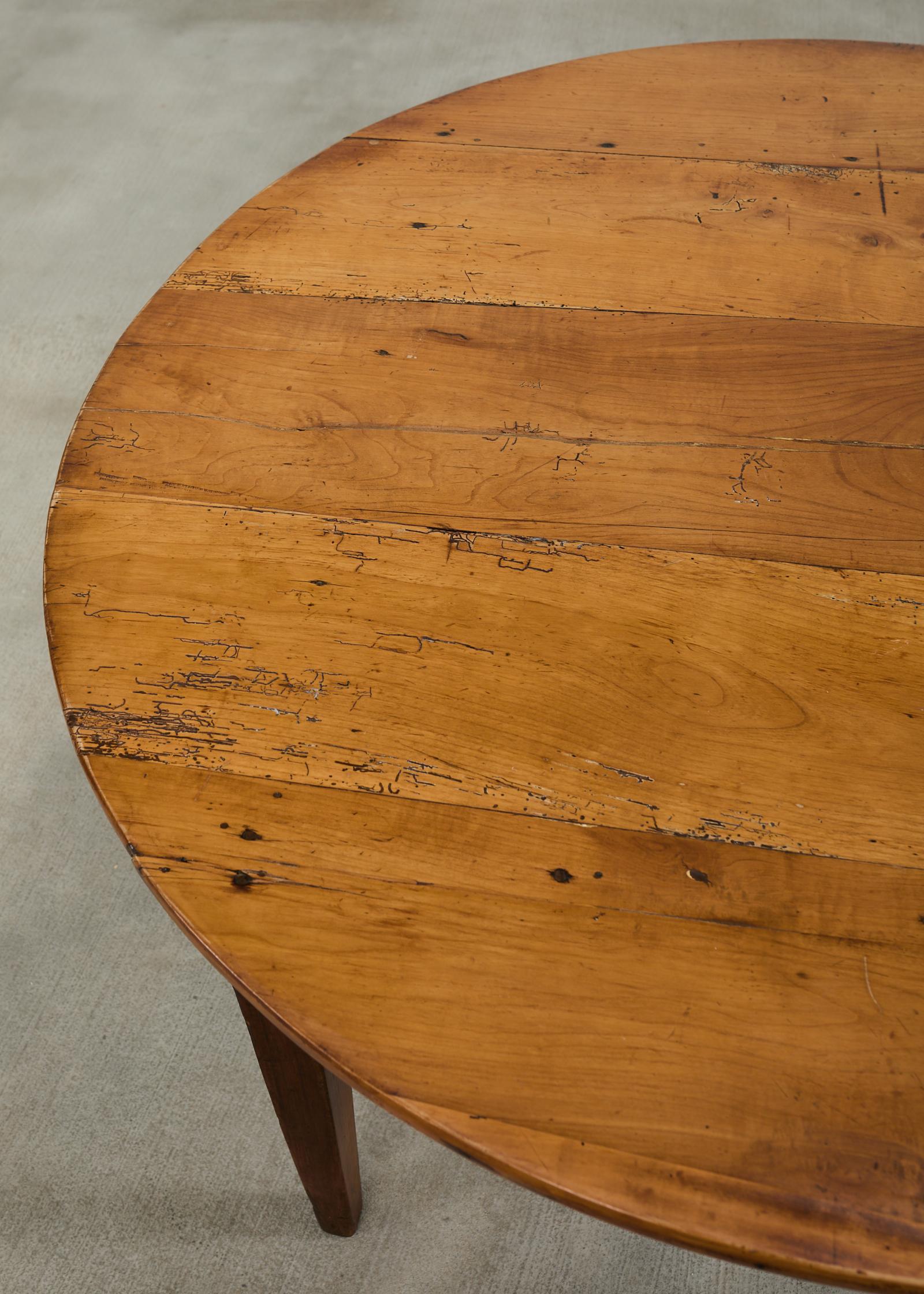 19th Century Country English Provincial Round Fruitwood Farmhouse Dining Table For Sale