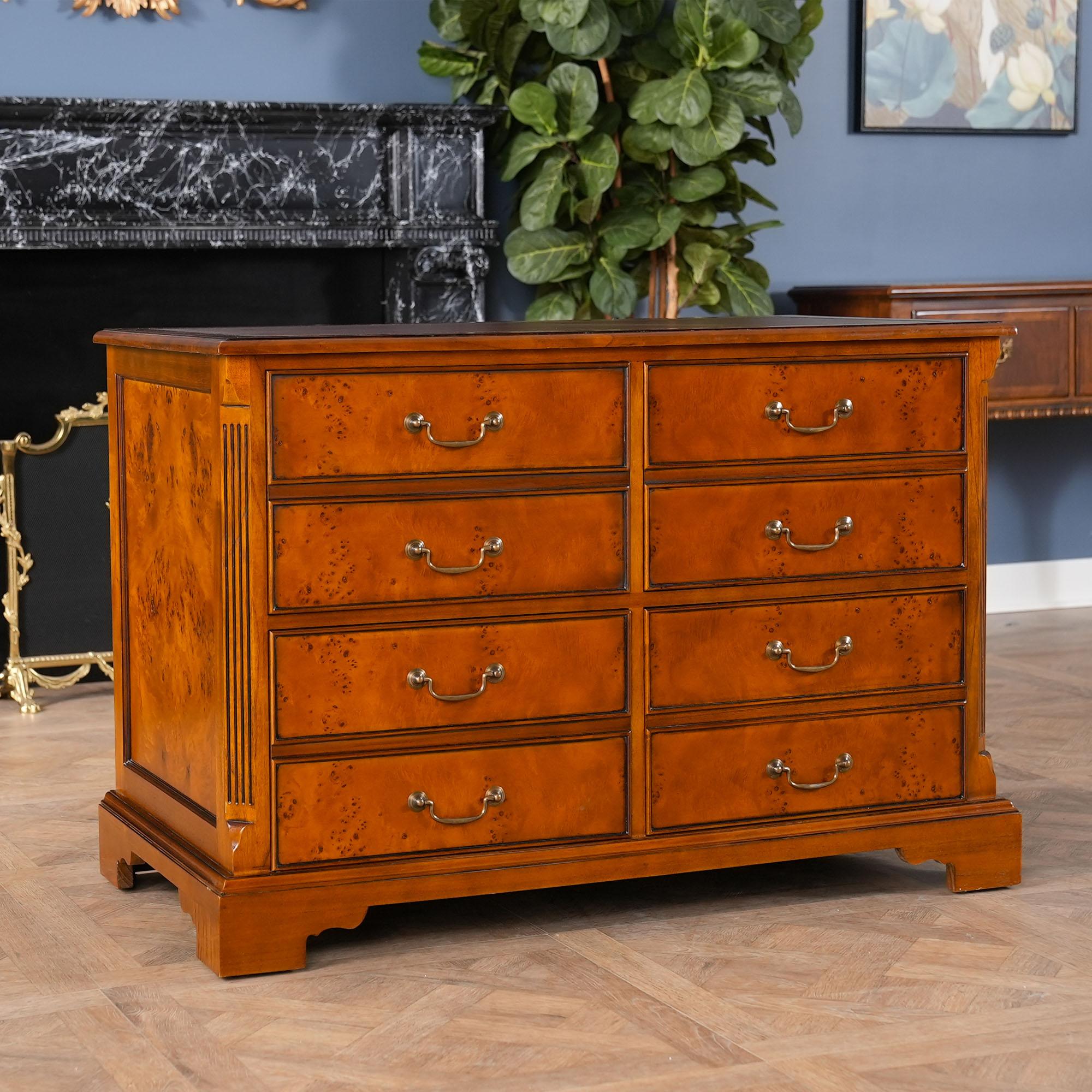 A highly functional and decorative piece this Country Estate Four Drawer File cabinet from Niagara Furniture is made with fine quality burled wood. The top of the cabinet is covered in a full grain brown leather panel which is attractively tooled