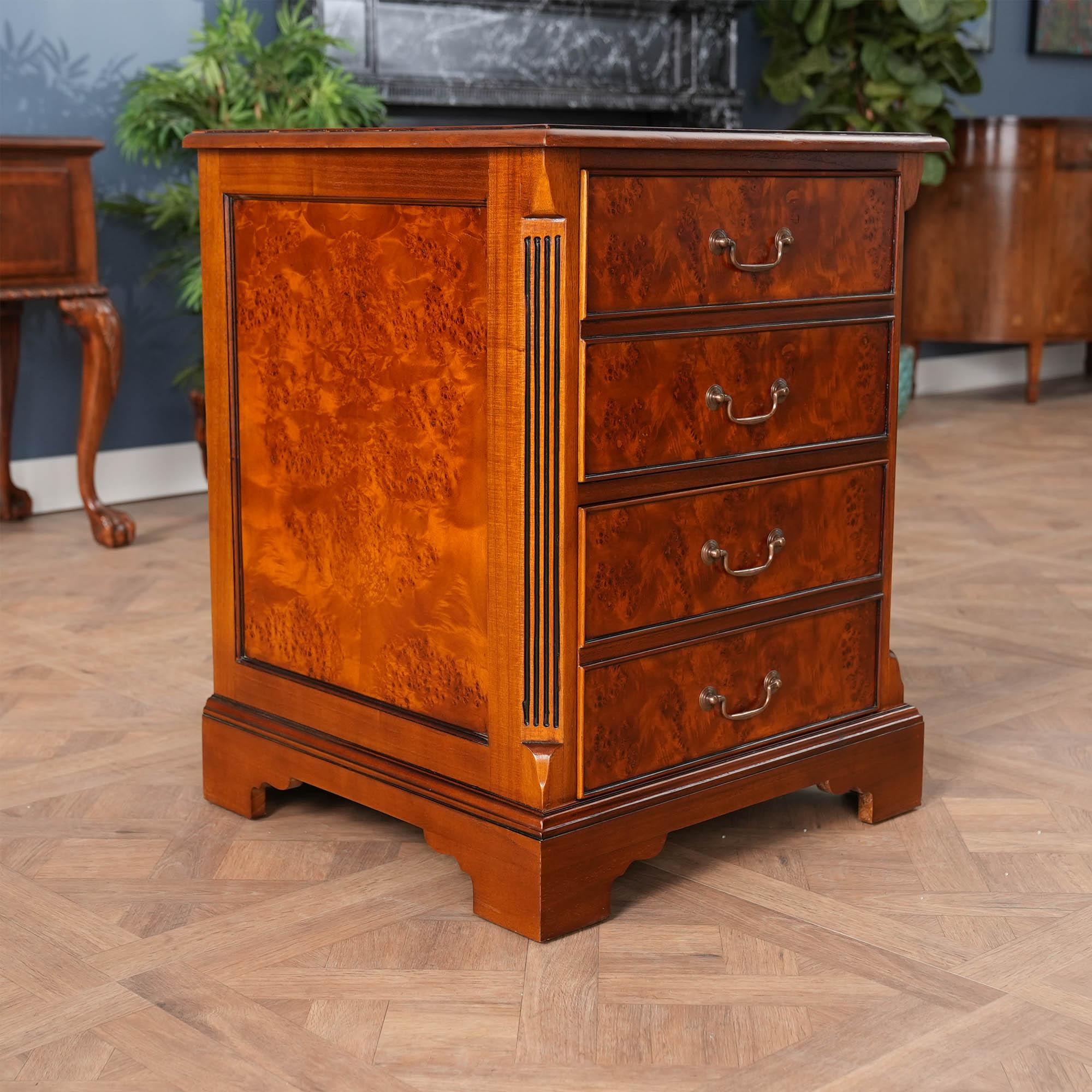 A high quality piece of office furniture from Niagara Furniture our Country Estate Two Drawer File is made from the finest burls available. The top of the cabinet is covered in a full grain brown leather panel which is attractively tooled around the