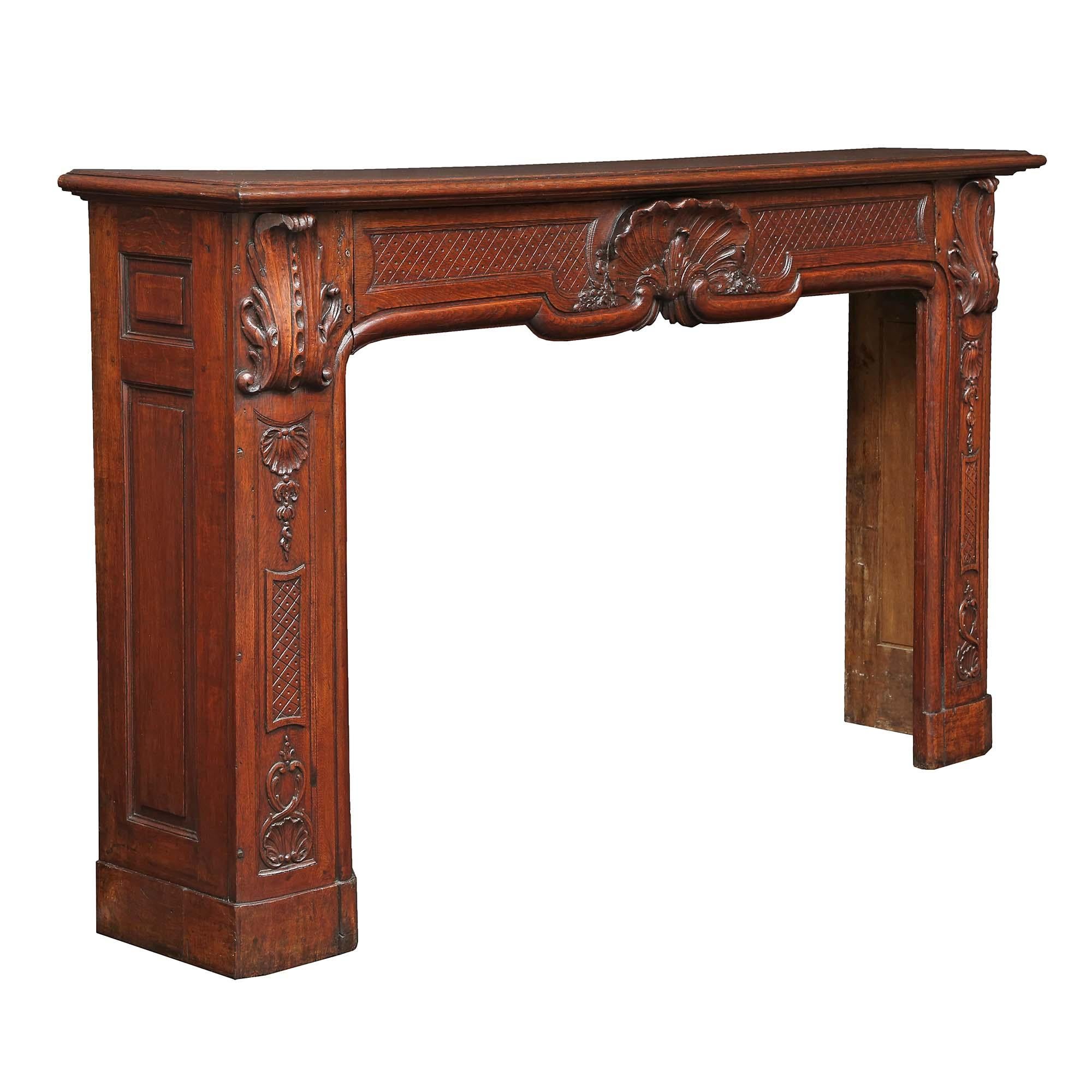 Country French 19th Century Louis XV Style Oak Mantel In Good Condition For Sale In West Palm Beach, FL