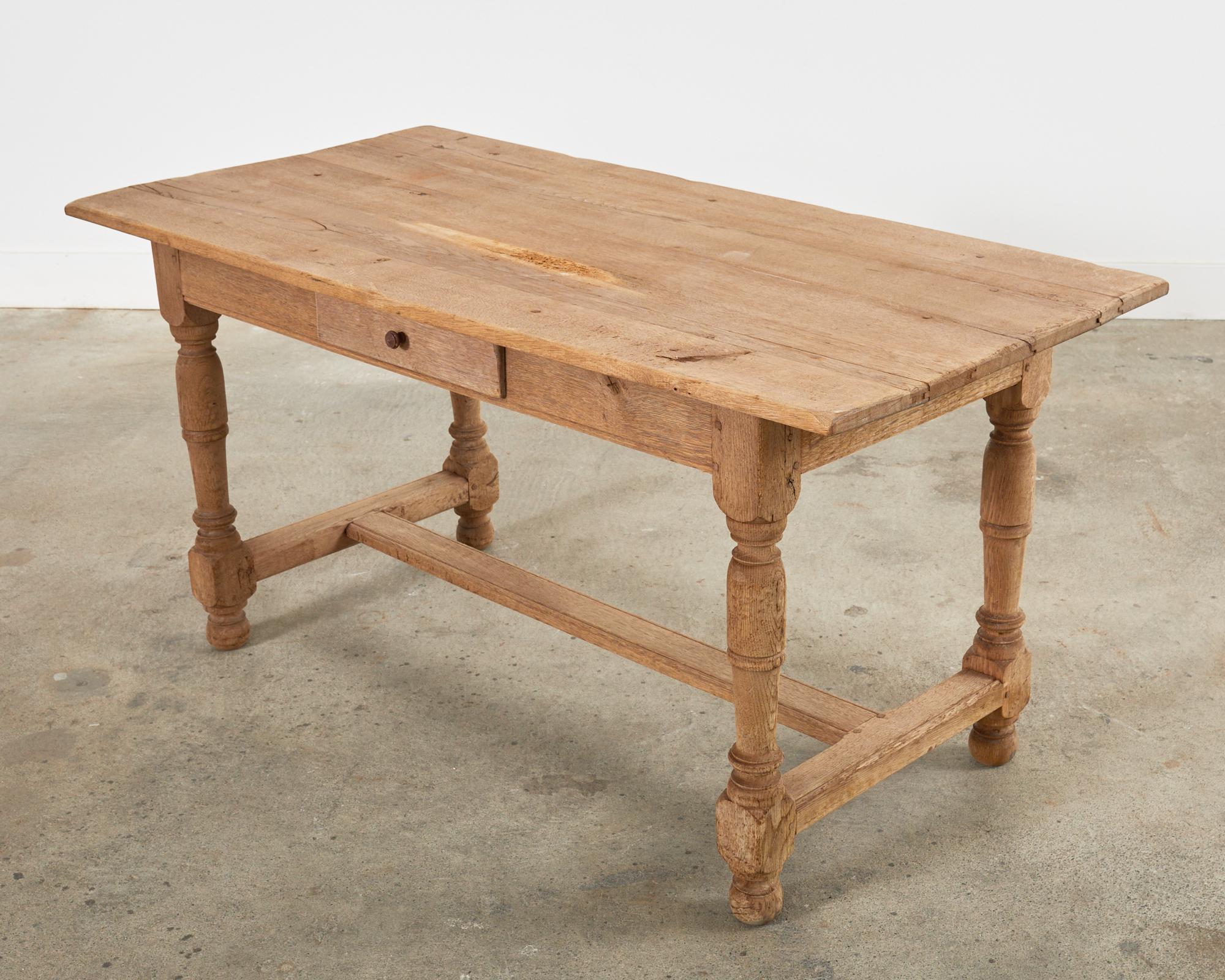 Country French Bleached Oak Farmhouse Dining or Writing Table In Distressed Condition In Rio Vista, CA