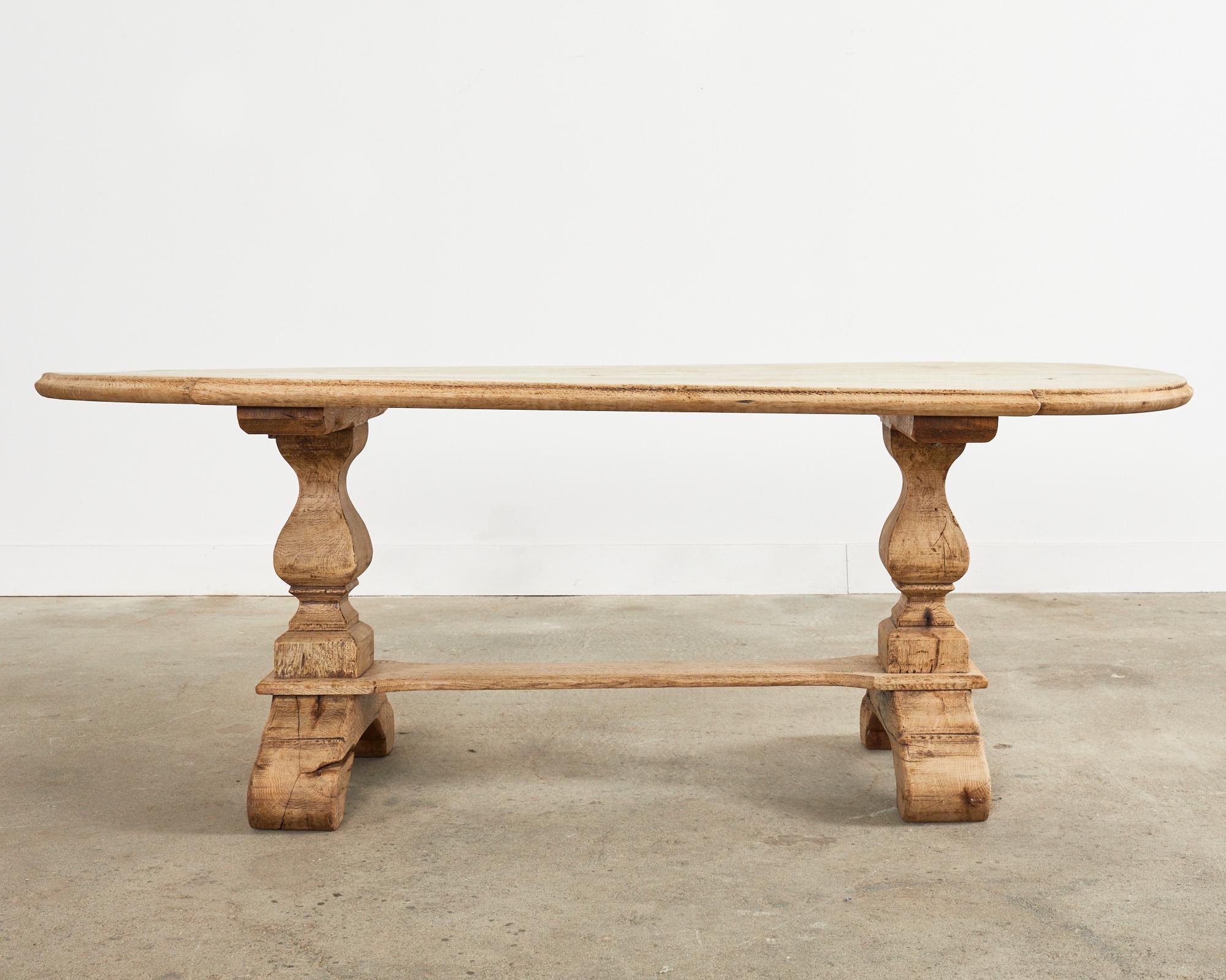 Country French Bleached Oak Farmhouse Dining Table with Round Ends In Distressed Condition For Sale In Rio Vista, CA