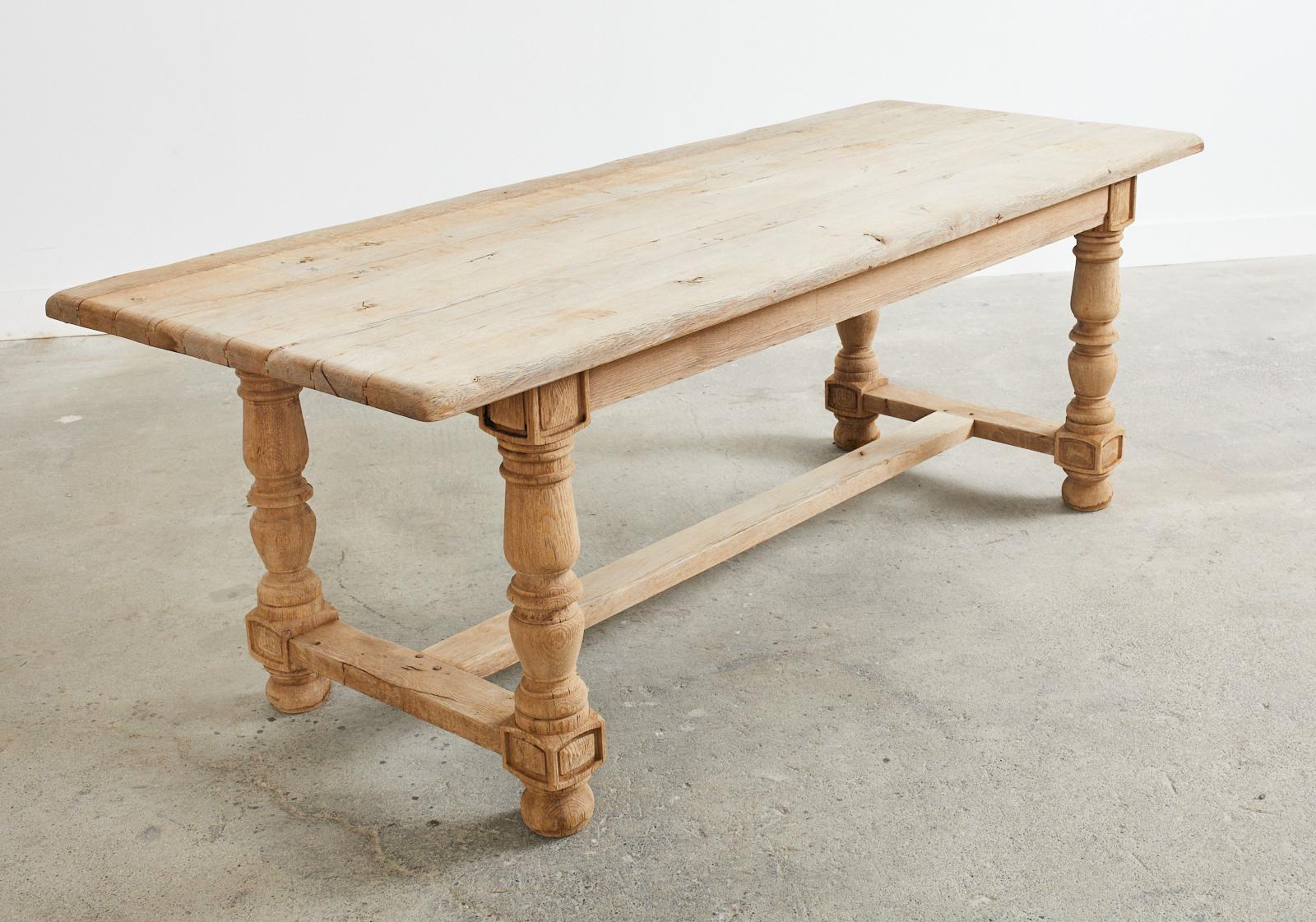 Country French Bleached Oak Farmhouse Trestle Dining Table In Distressed Condition In Rio Vista, CA