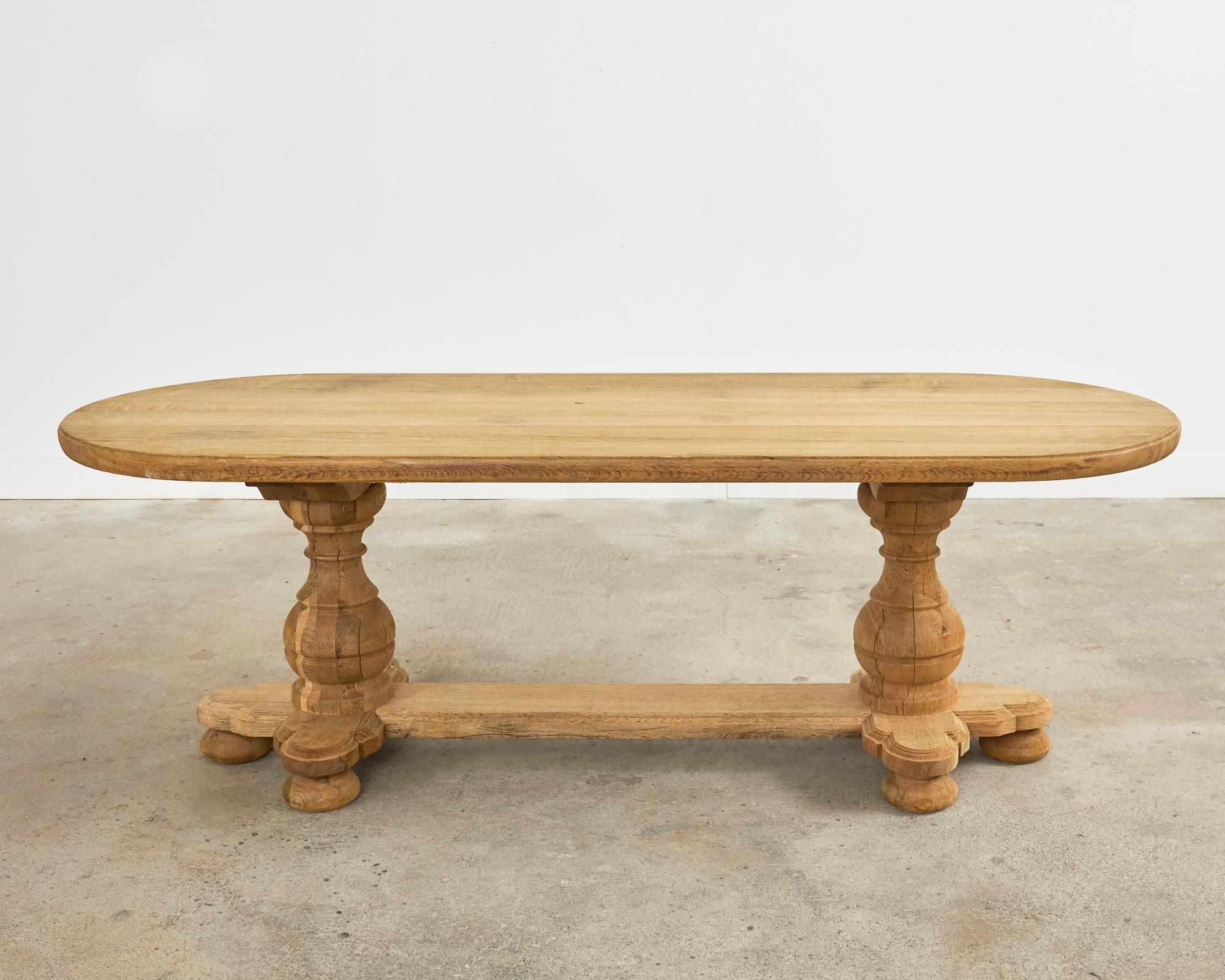 Country French Bleached Oak Oval Farmhouse Trestle Dining Table In Good Condition In Rio Vista, CA