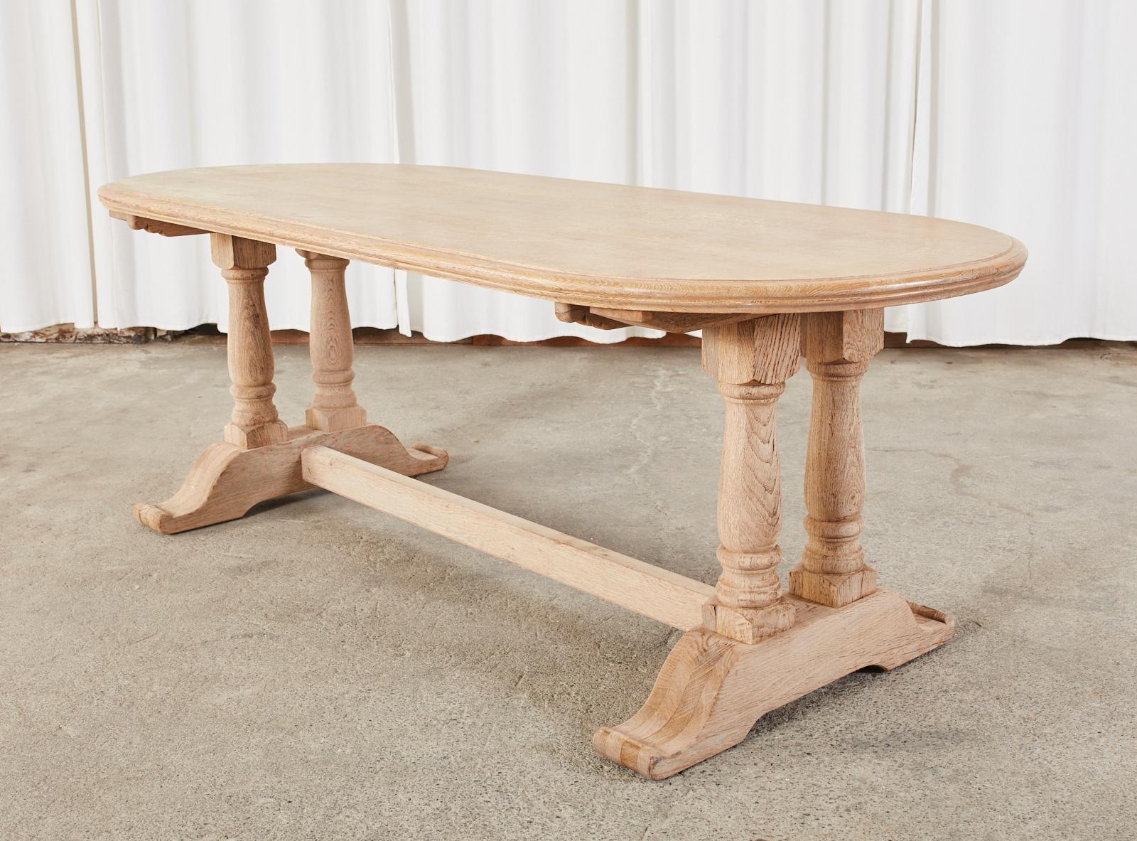 Country French Bleached Oak Oval Trestle Dining Table In Good Condition In Rio Vista, CA