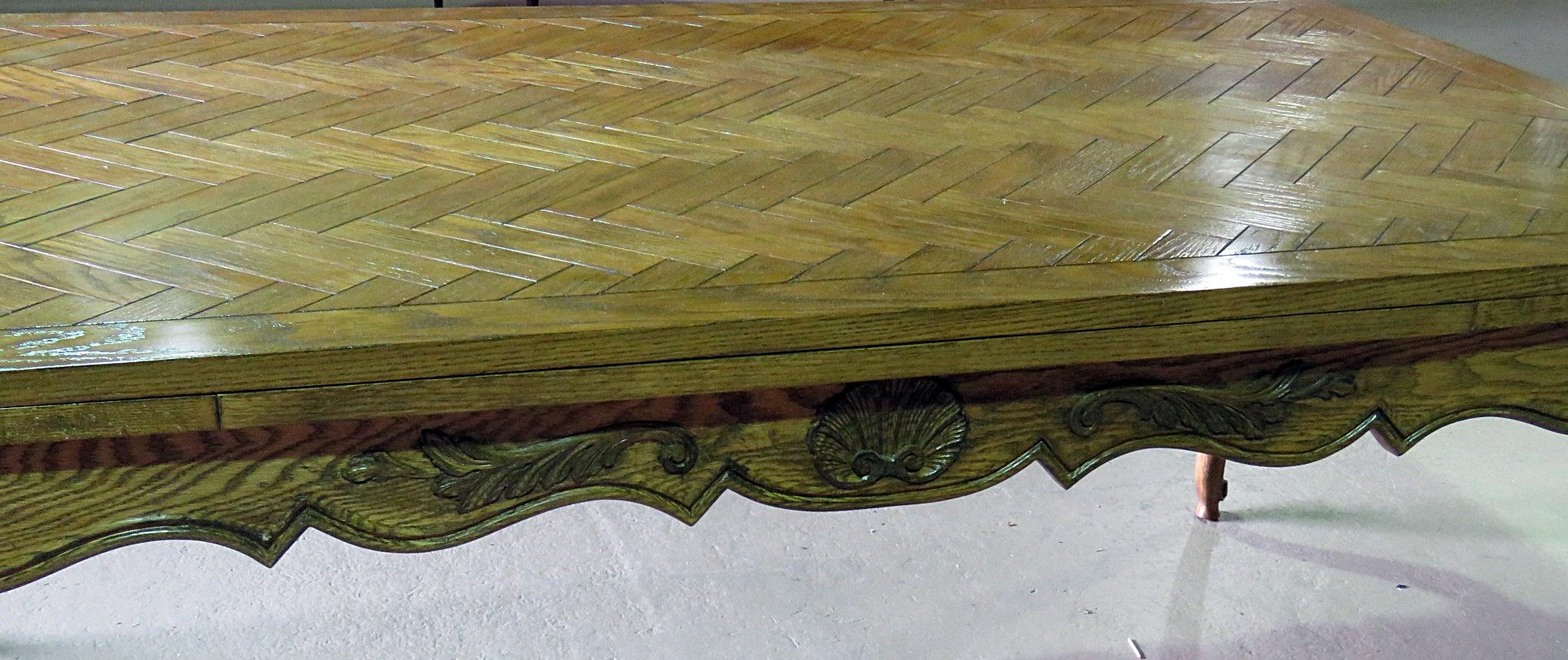 Country French dining room table, attributed to Don Rousseau, with 2 20
