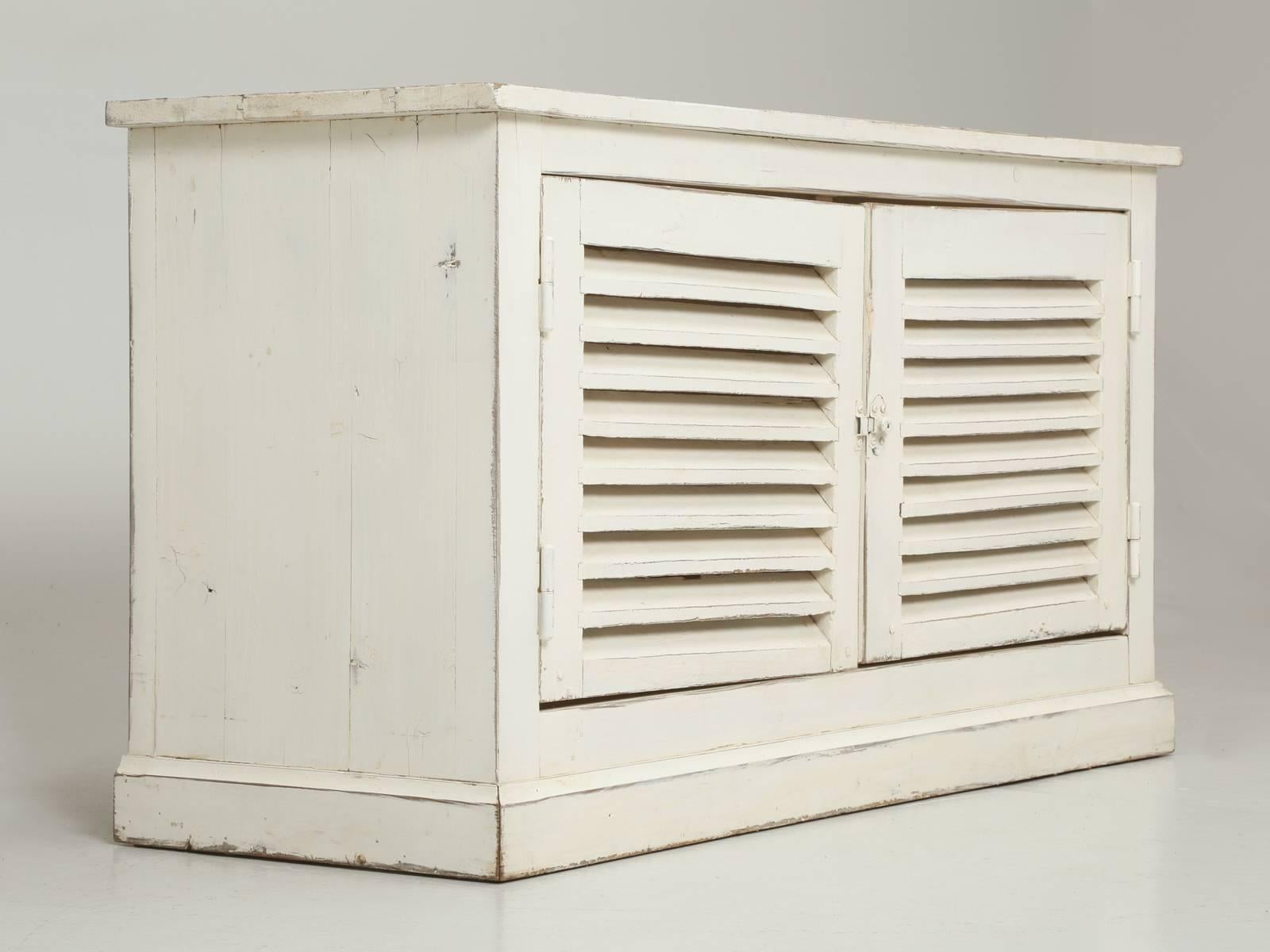 Country French Louvered low Cabinet, that we found along the Route de Fougères in Northern France. Our opinion is, that someone had some old shutters laying around and wanted to make a country French style low Buffet, which would be ideal to place a