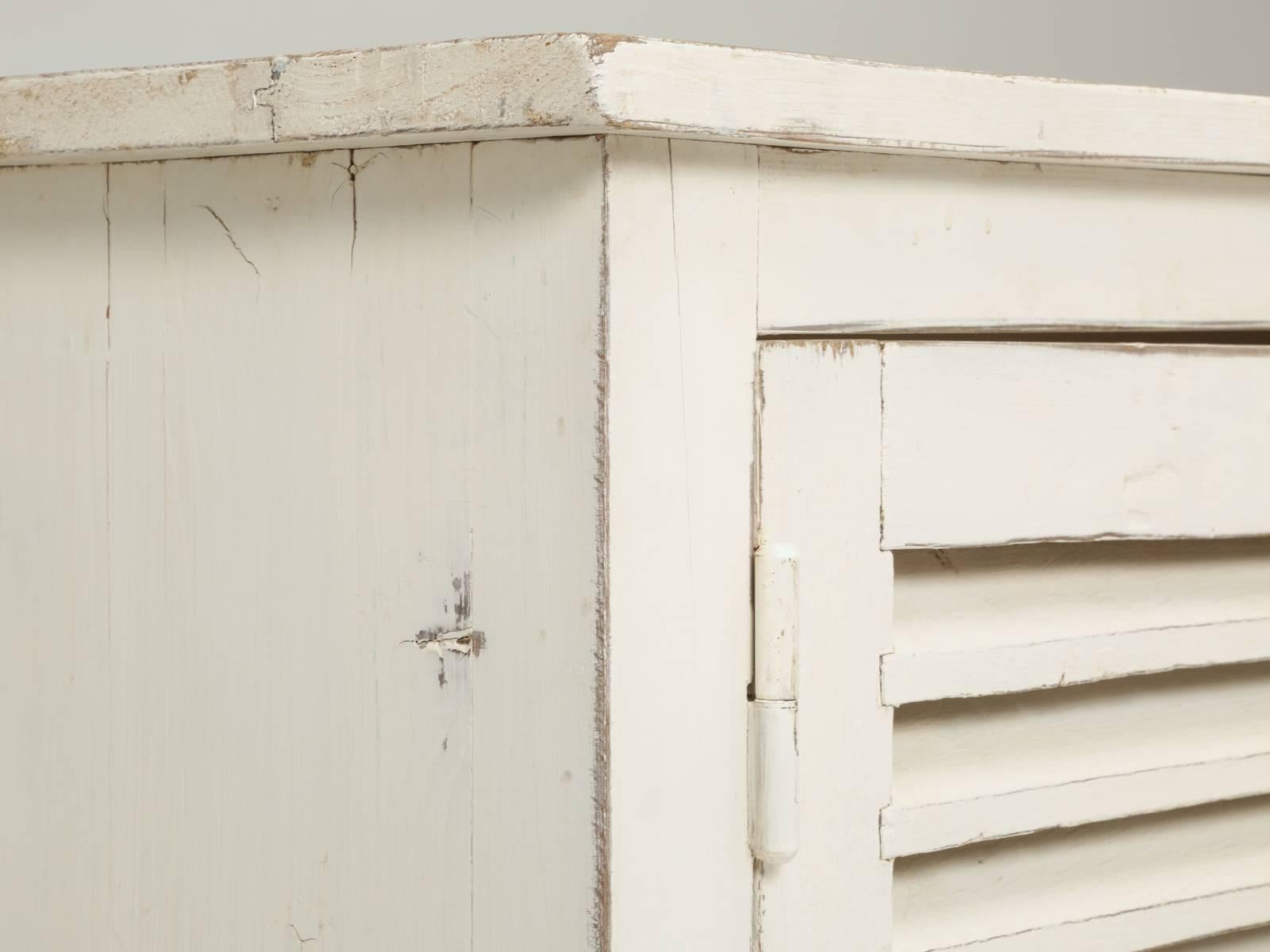Hand-Crafted Country French Louvered Cabinet, Low Buffet Distressed White Paint From Brittany For Sale
