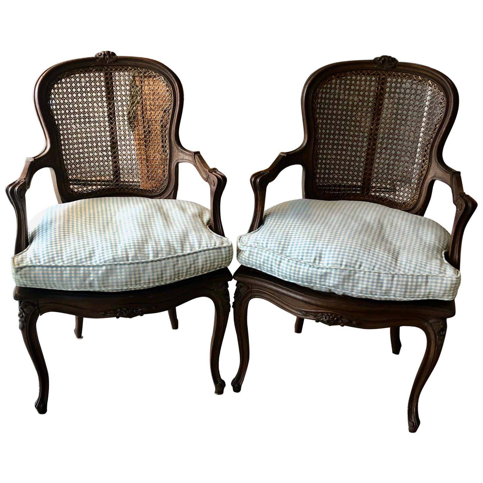 Country French Pair of Carved Walnut and Caned Armchairs