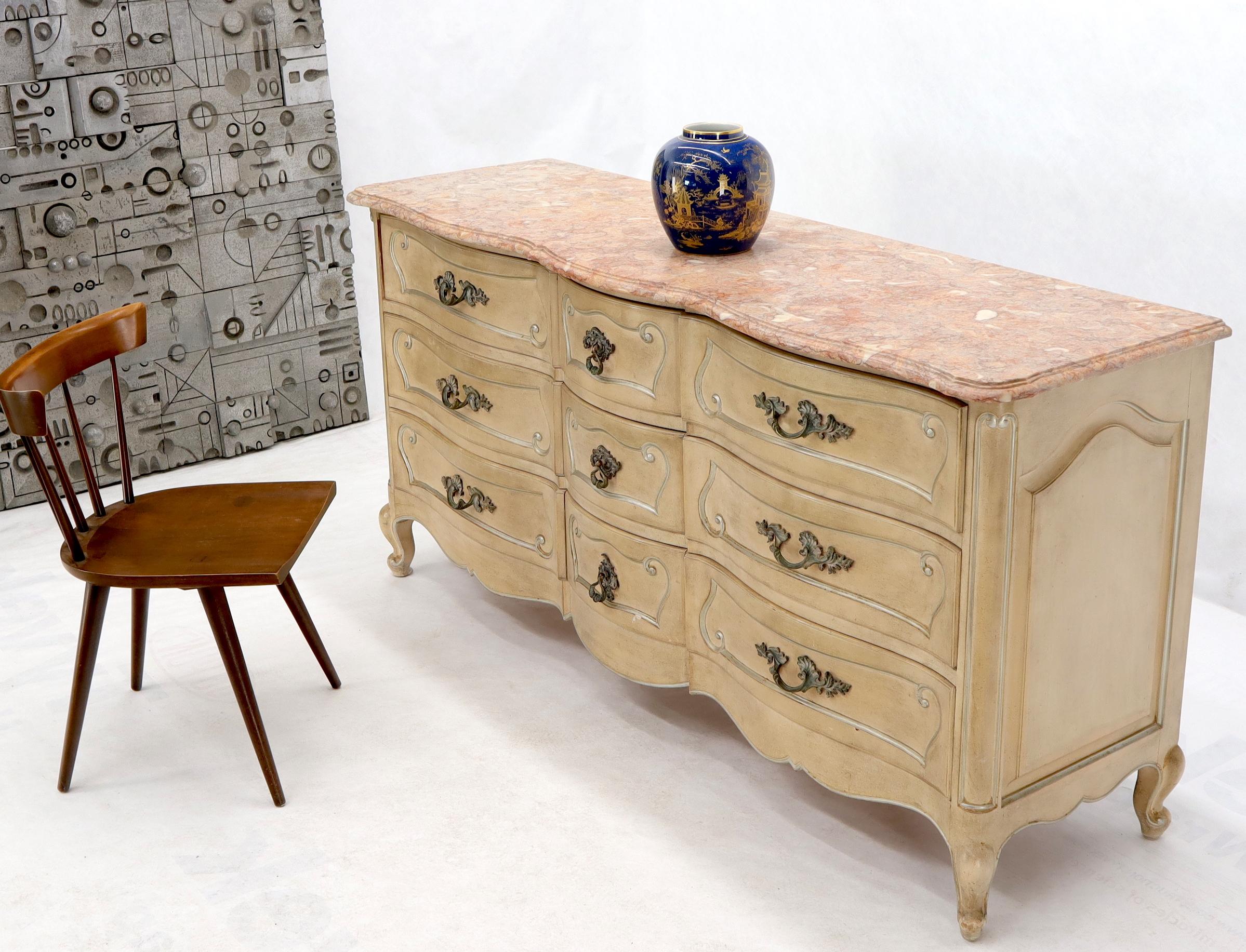 Very fine quality pink marble top French Country 9 drawers dresser with brass hardware.