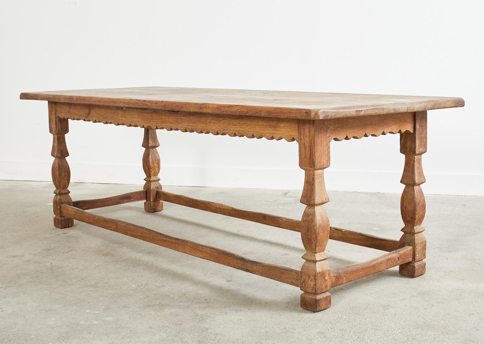 Country French Provincial Oak Farmhouse Scalloped Trestle Dining Table In Distressed Condition In Rio Vista, CA