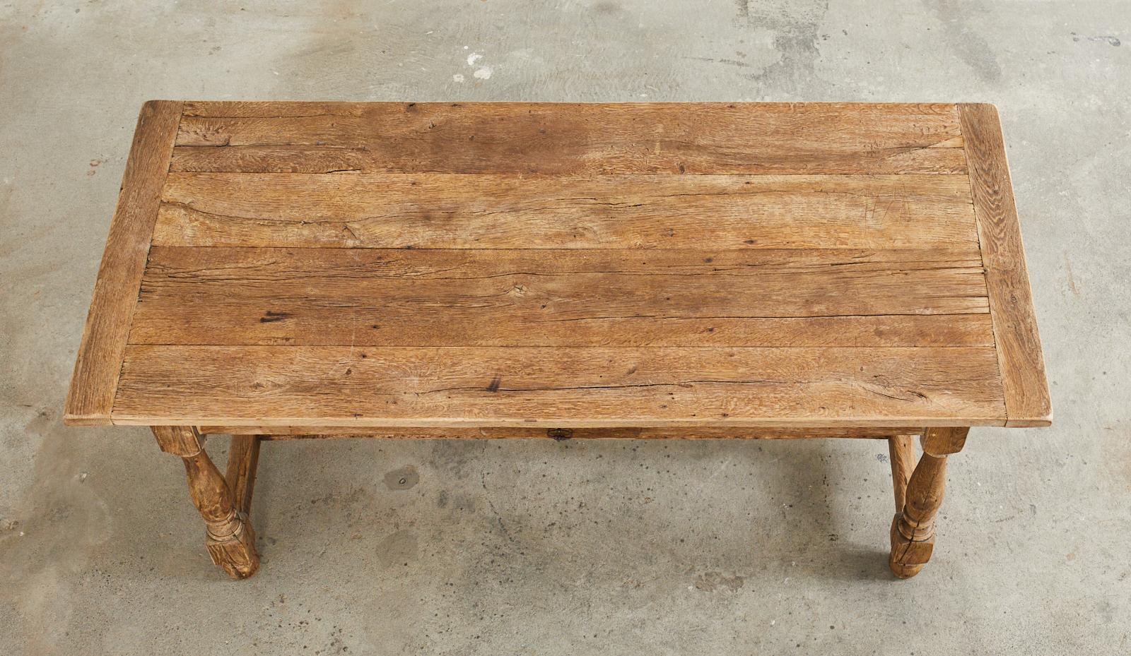 Country French Provincial Oak Farmhouse Trestle Dining Table In Distressed Condition In Rio Vista, CA