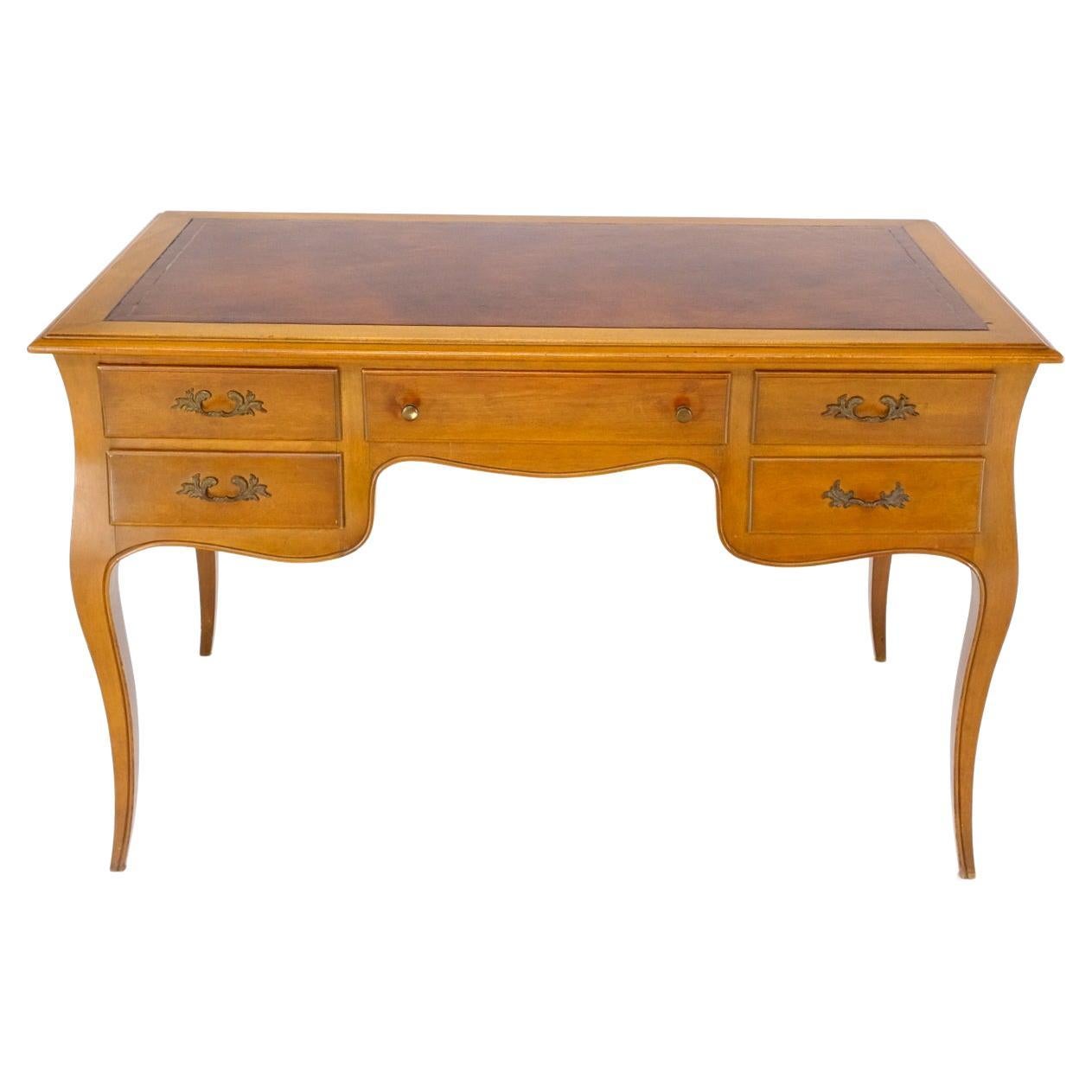High quality craftsmanship solid walnut french country desk with leather top.