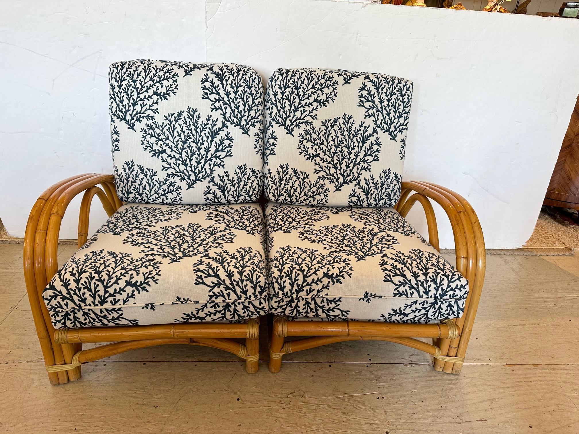 Stunning vintage bamboo club chairs or if pushed together, comfy loveseat, having new straps and wonderful blue and white coral pattern cushions.  Perfect for your country retreat in Maine or Nantucket!
arm height 20
seat depth 20