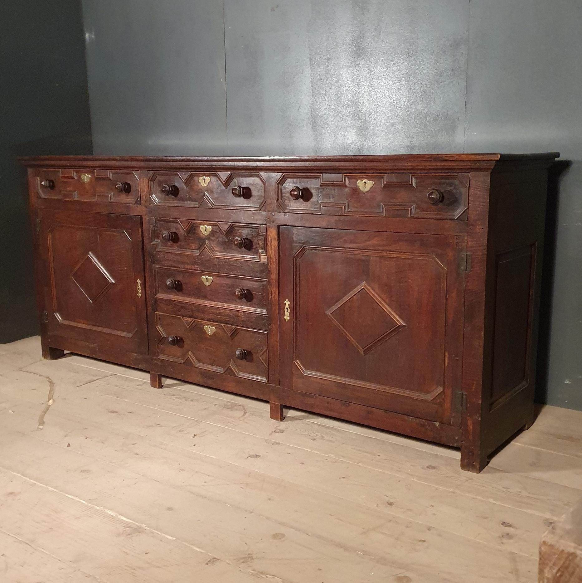 Huge early 18th century country house oak dresser base. Really good color, 1730.

Dimensions
89.5 inches (227 cms) wide
21.5 inches (55 cms) deep
38 inches (97 cms) high.