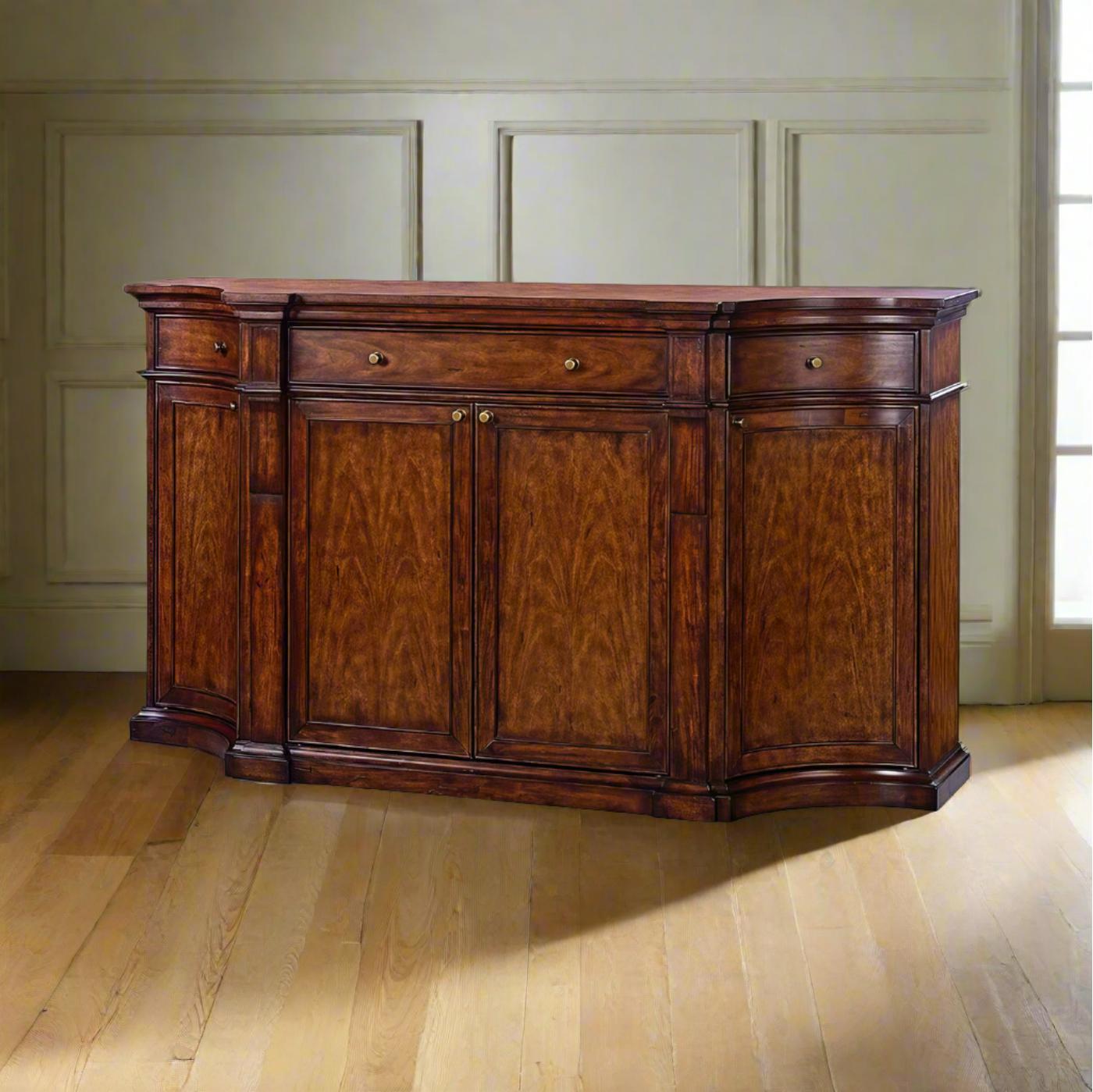 With a rich medium wood finish, this sideboard features a beautifully shaped frame with intricate molding and a sturdy plinth base, exuding timeless charm. 

With four cupboard doors, three drawers, and interior shelving, this piece offers ample