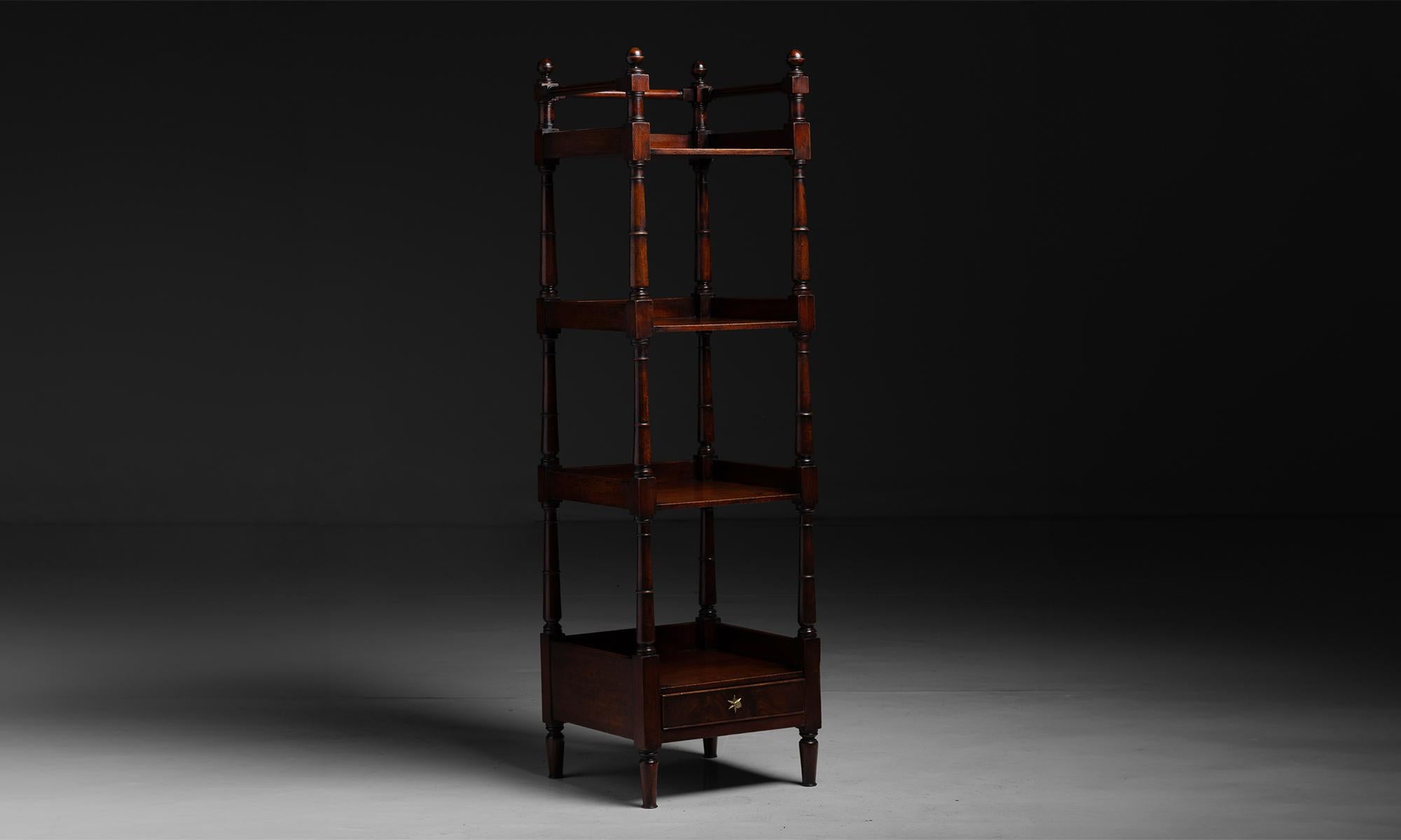 Country House Etagere

England circa 1900

Library etagere in mahogany with fitted drawer on the base.

Measures 17.5