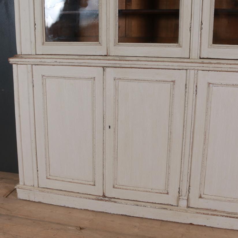 19th century painted country house bookcase or dresser, 1840

Dimensions:
101 inches (257 cms) wide
15.5 inches (39 cms) deep
101.5 inches (258 cms) high.

 