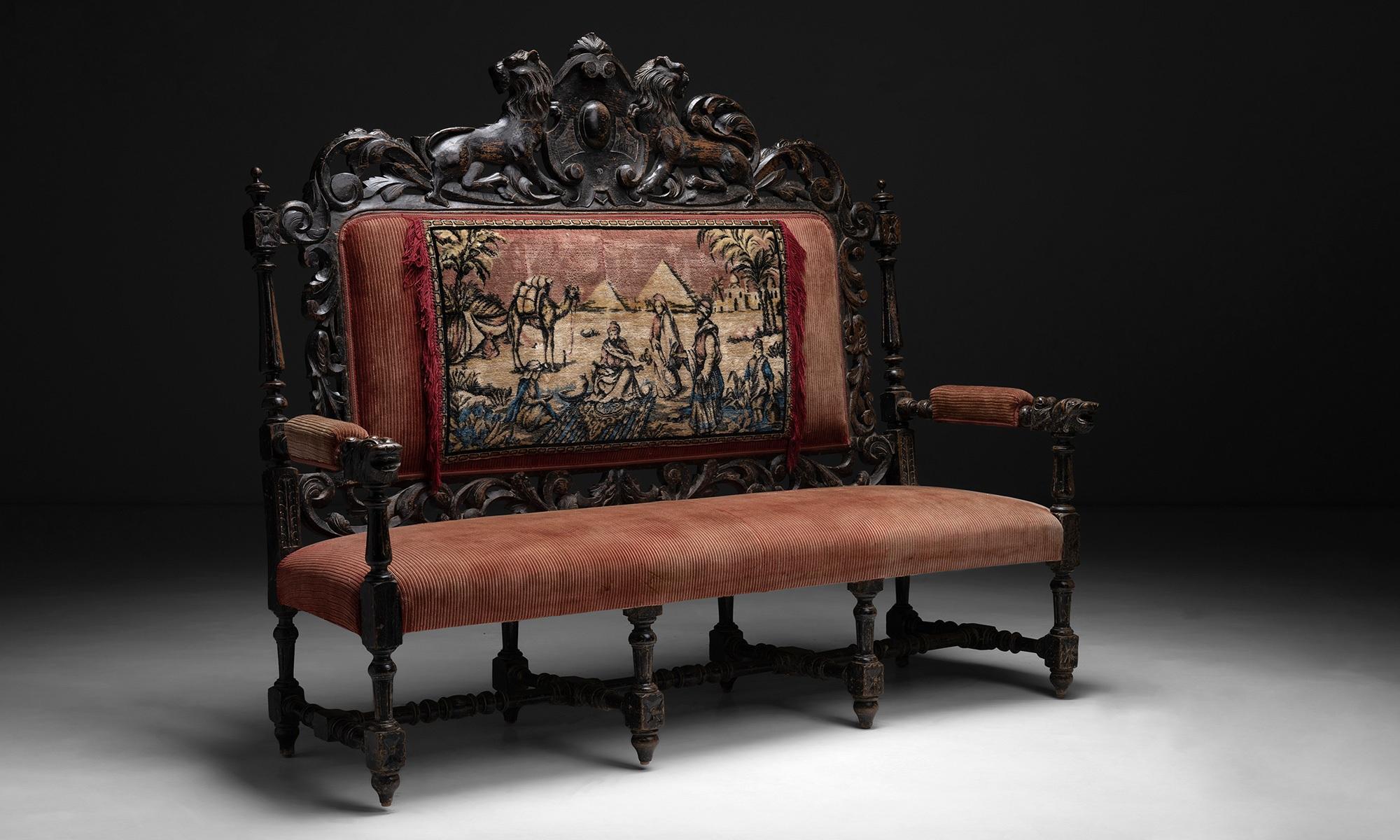 Country house settee.

England circa 1800

Original upholstery with tapestry panel depicting the pyramids of Egypt with carved frame. Originally from a Georgian era farmhouse in Devon.

Measures: 71.25”L x 26.5”D x 17.5”H x 58.75”seat.