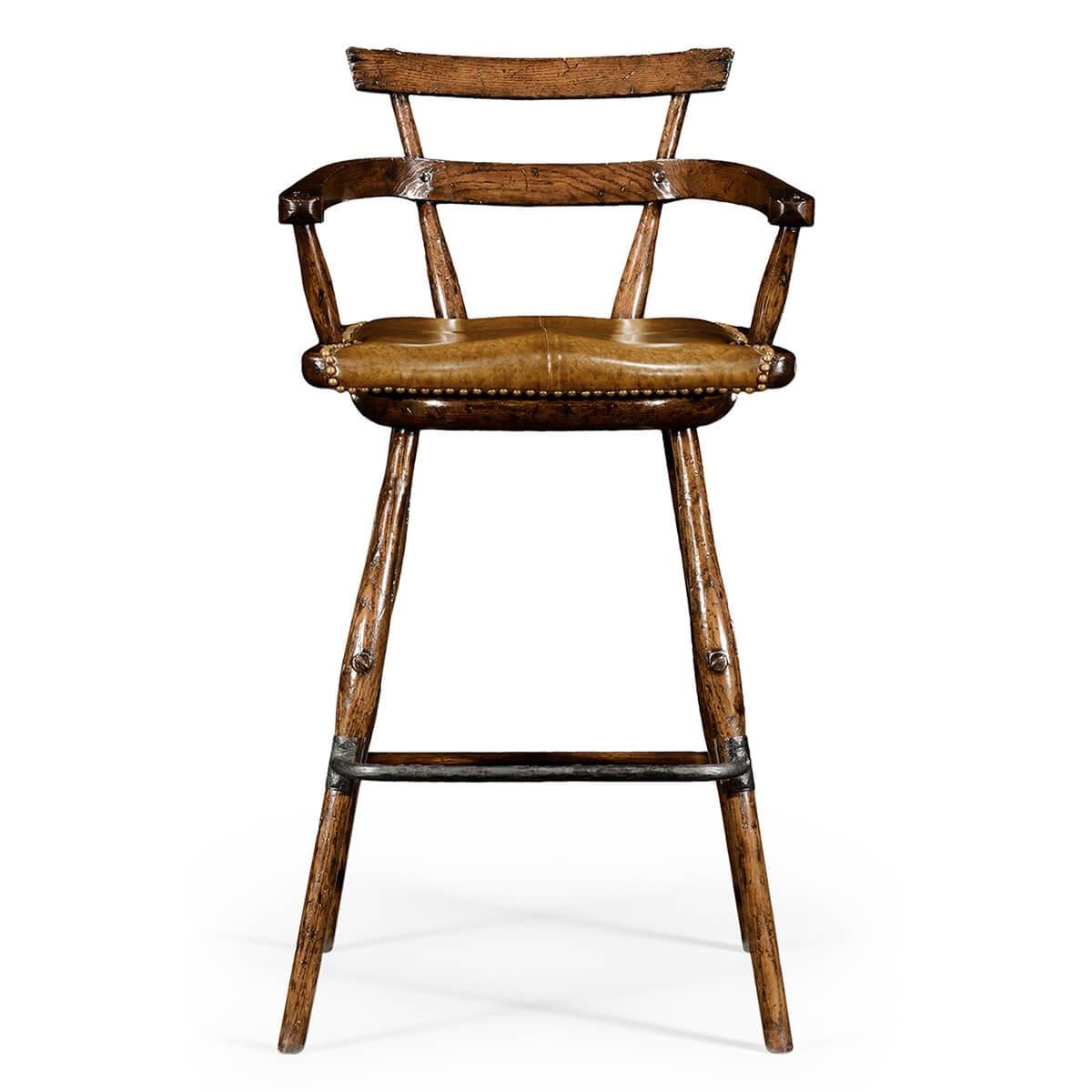 Unusually shaped and distressed oak country style barstool with a tapering back support above sweeping arms that extend from one of the slats. Studded brown leather seat above swollen legs and stretchers.

Dimensions: 22.75