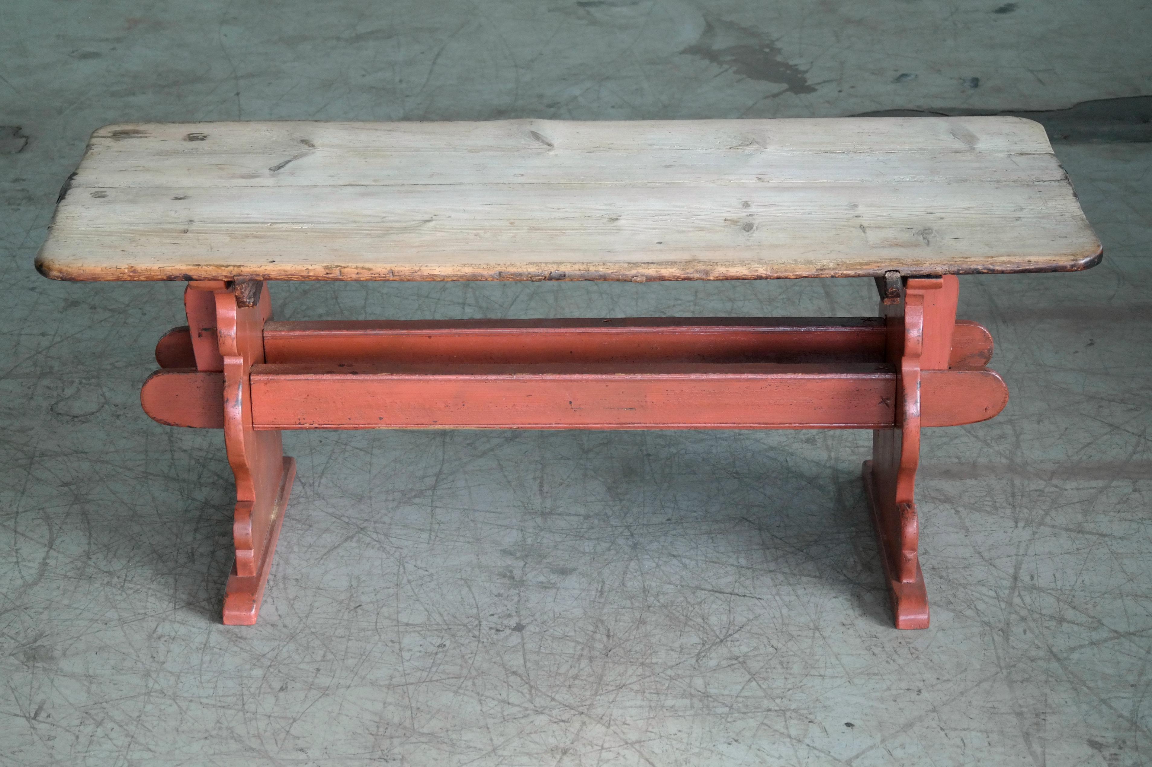 We found this charming country table in Denmark - entirely made of thick solid pine and held together without any use of screw, nails or other hardware just tongue in groove and wooden pegs. Probably made around 1900 and remains sturdy and strong.