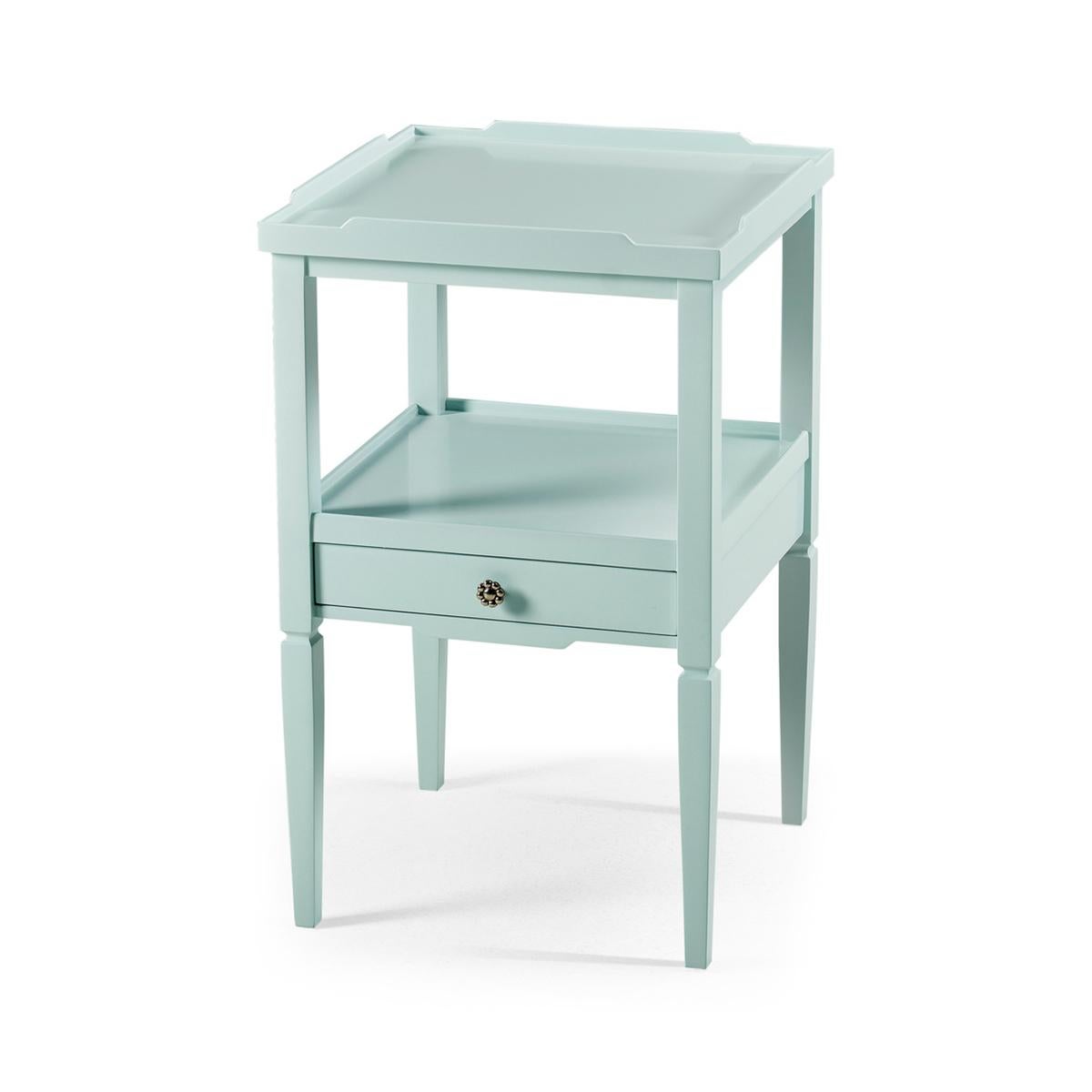 Country painted two tier end table, with a galleried top and a lower drawer shelf lined with a blue and white print. Finished in Palladian Blue with custom cast hardware and square tapered legs.

Dimensions: 16