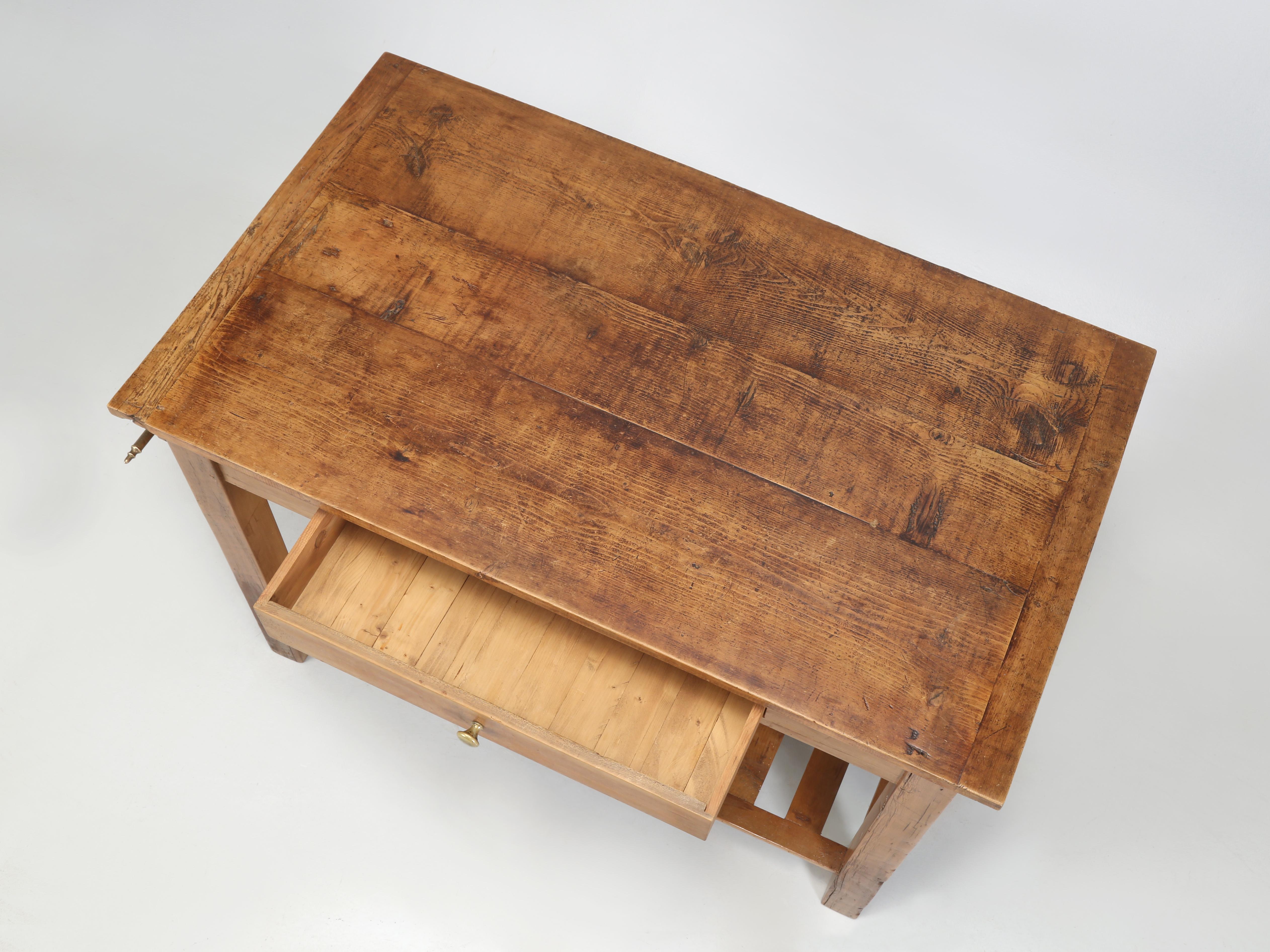 Vintage Pine Kitchen Island that a skilled craftsman with a sharp eye for proportion constructed from Reclaimed Pine lumber. Usually when we run across a Kitchen Island that someone constructed, who is not in the trade, there is always something