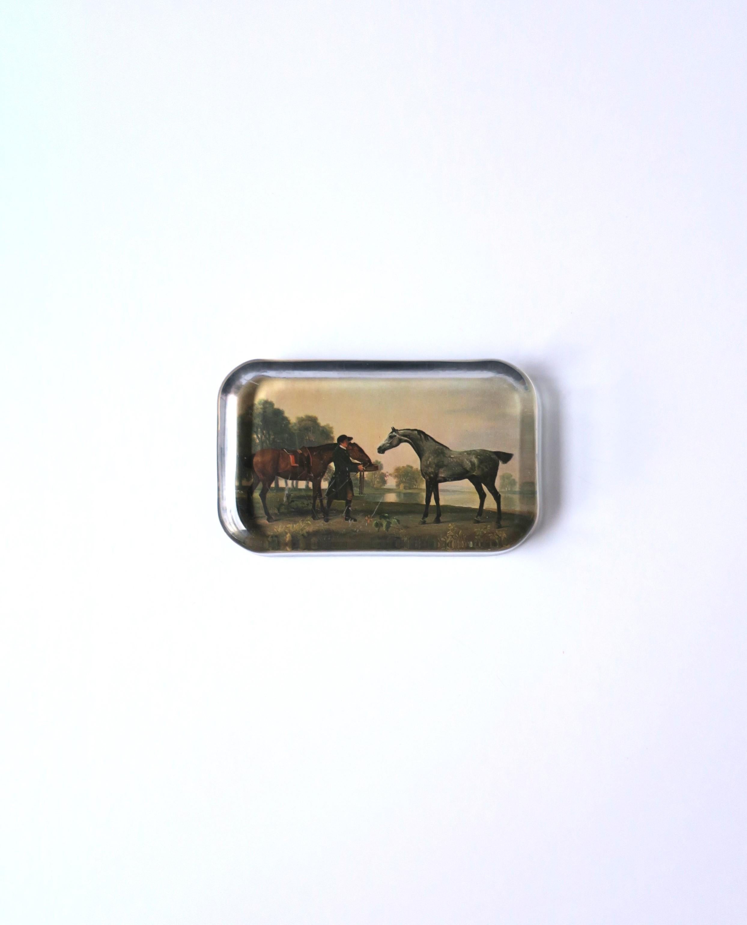 A glass and paper decoupage paperweight of an English country scene with horses, circa 1970s, Engand. A great piece for a desk, library, side/end table, etc. Dimensions: 2.63