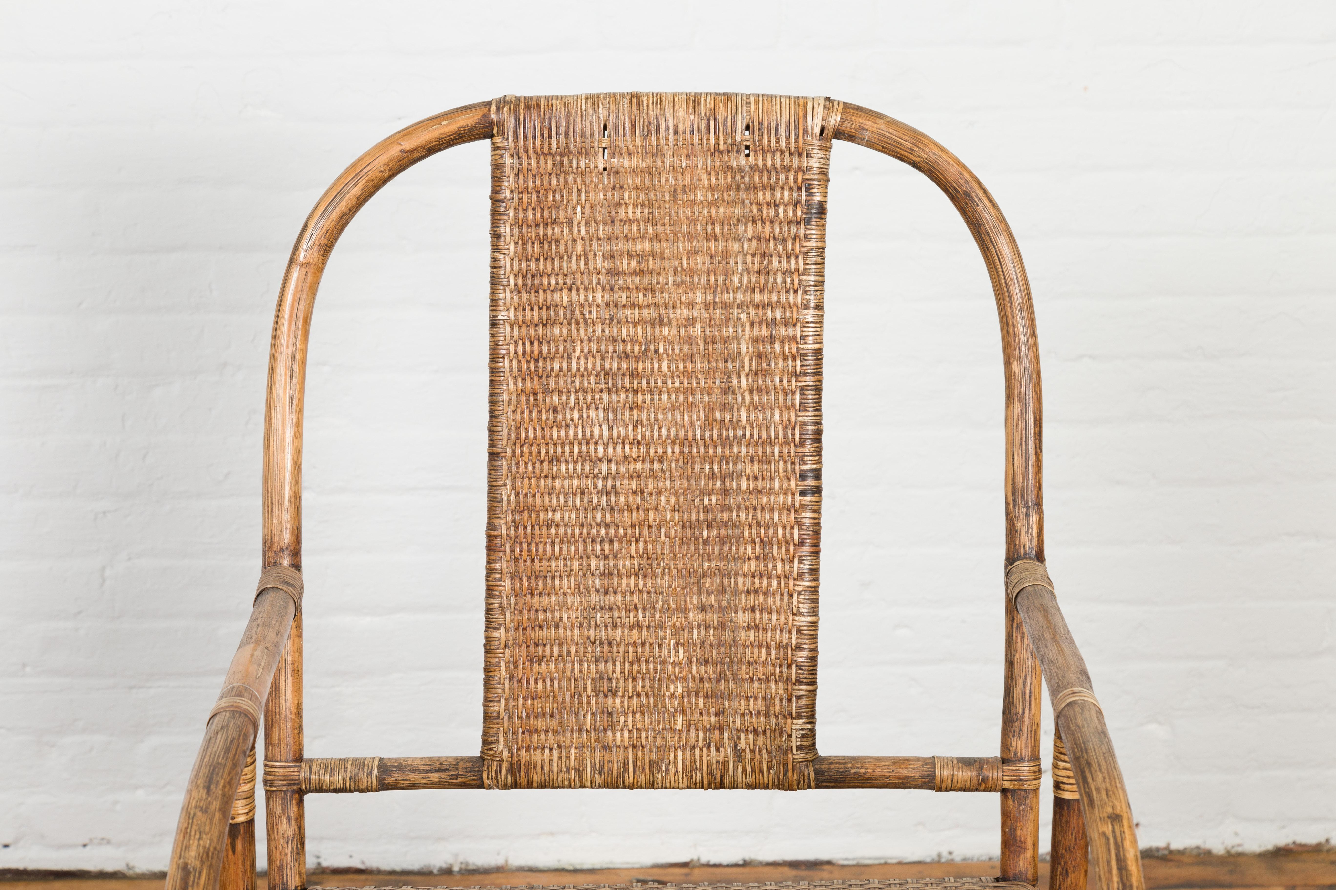 20th Century Country Style Burmese Vintage Hand-Woven Rattan Armchair with Rounded Back For Sale