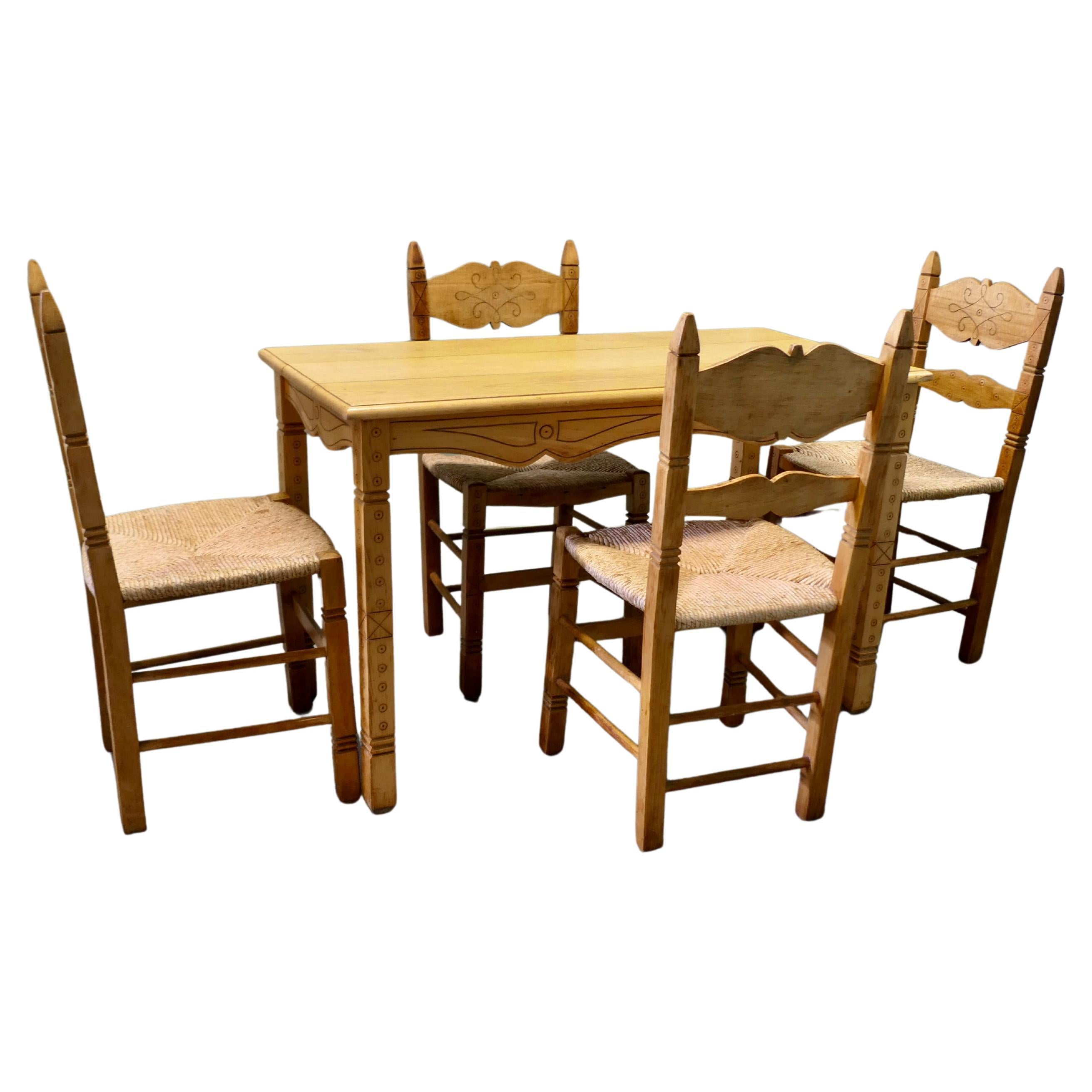 Country Style Carved Dining Table and 4 Chairs This is a very pretty set
