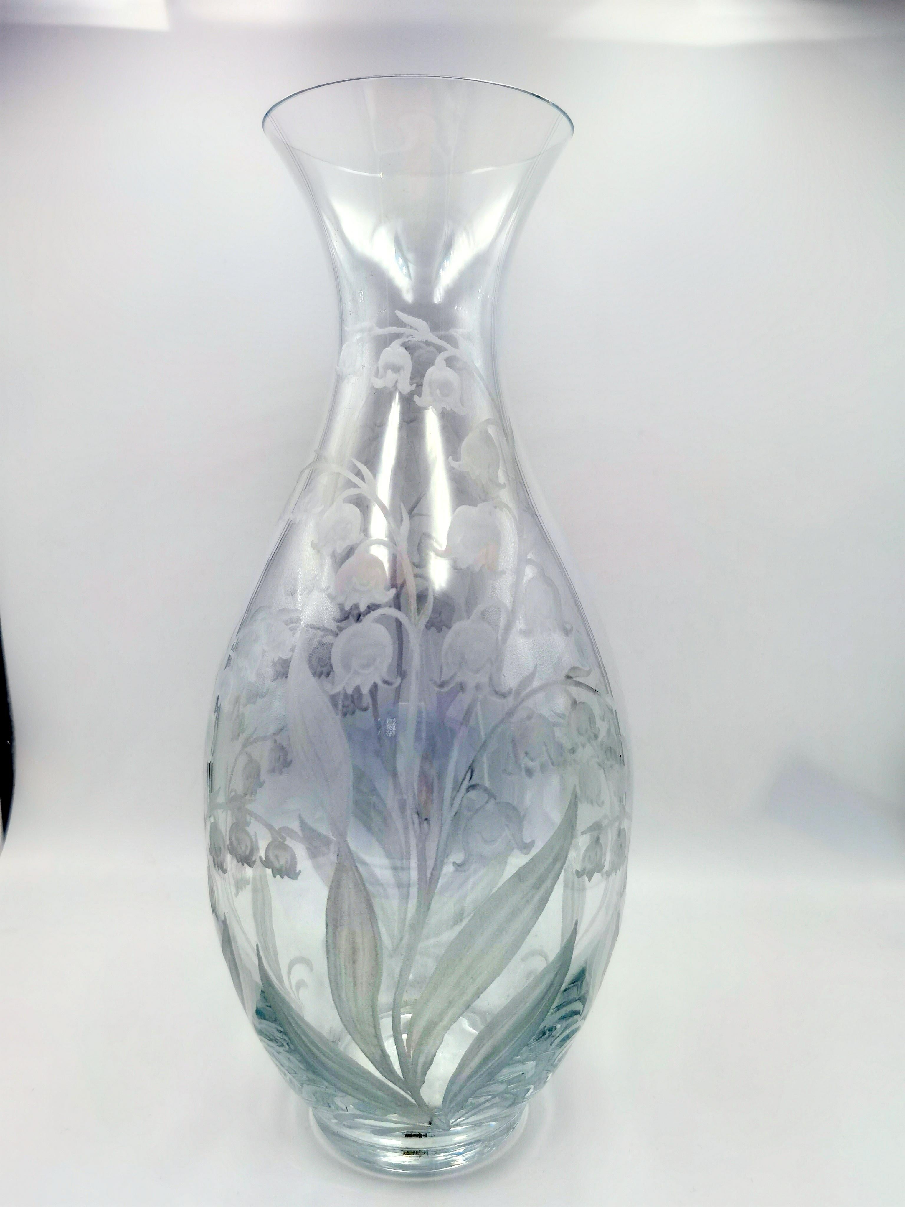 Hand blown carafe in clear crystal with a hand-engraved country style decor Lily of the Valley all around. Handmade in Bavaria for Sofina Boutique Kitzbühel Austria. A matching vase and tumblers are available. Can be ordered in different colors.