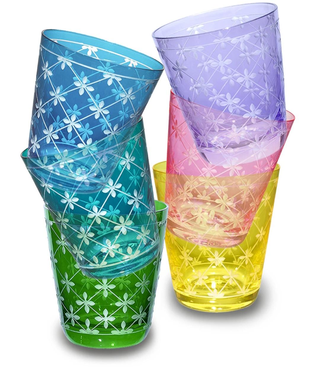 Hand blown carafe in pink crystal with a hand-engraved grafic decor all around. Handmade in Bavaria for Sofina Boutique Kitzbühel Austria. Matching tumblers are available. Can be ordered in different colors. Colored crystal is not recommended for