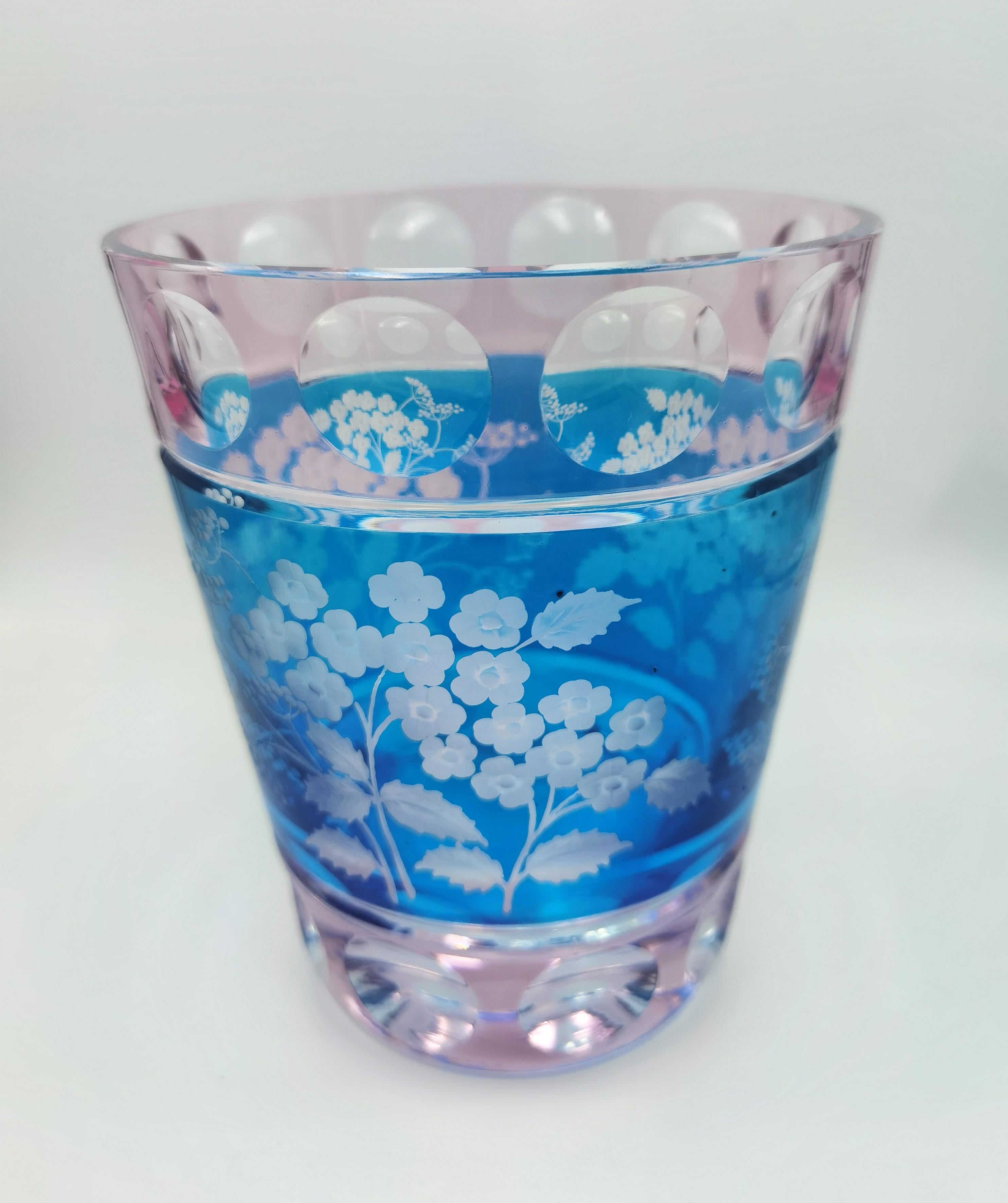 Hand blown crystal vase in 2 colors blue and pink with peonies all around the vase. The decor is hands-free engraved by glass artists in Bavaria by Sofina Boutique Kitzbuehel. Sofina glass and porcelain was found 2013 in Bavaria and lies a reversion