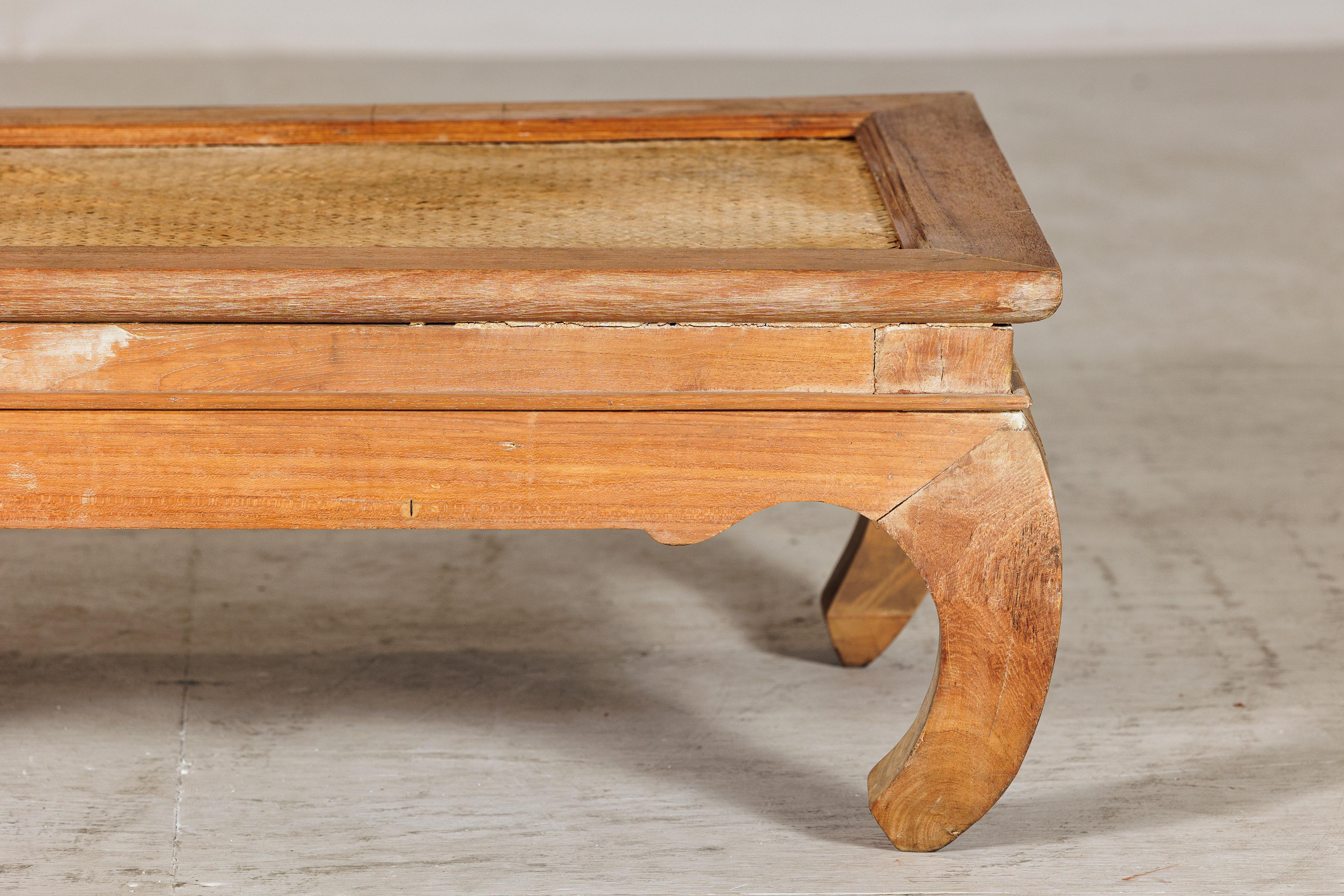 Indonesian Country Style Low Wood Coffee Table with Woven Mat Top and Curved Legs For Sale
