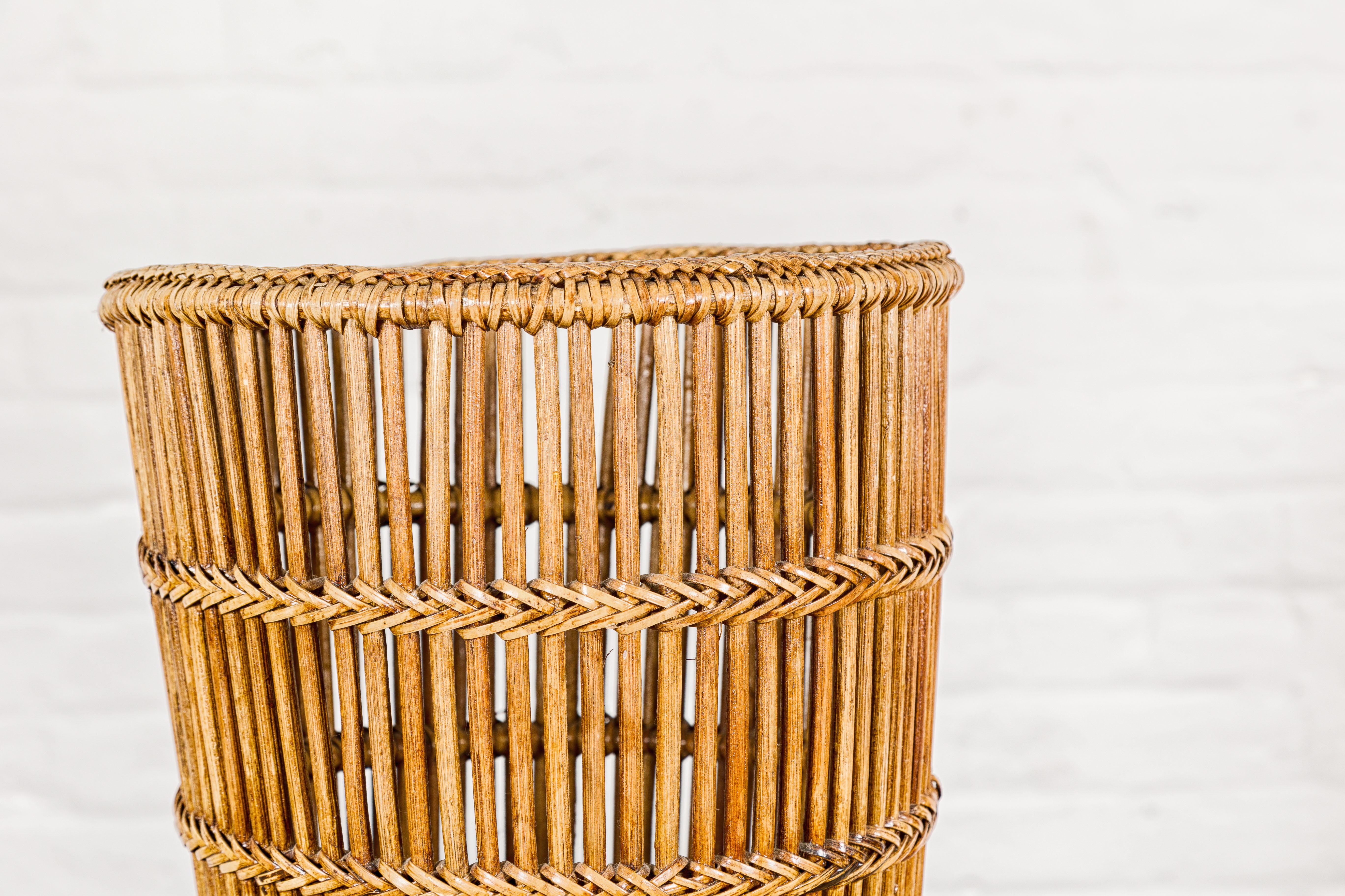 20th Century Country Style Rattan Waste Basket with Braided Woven Accents and Tapering Lines For Sale