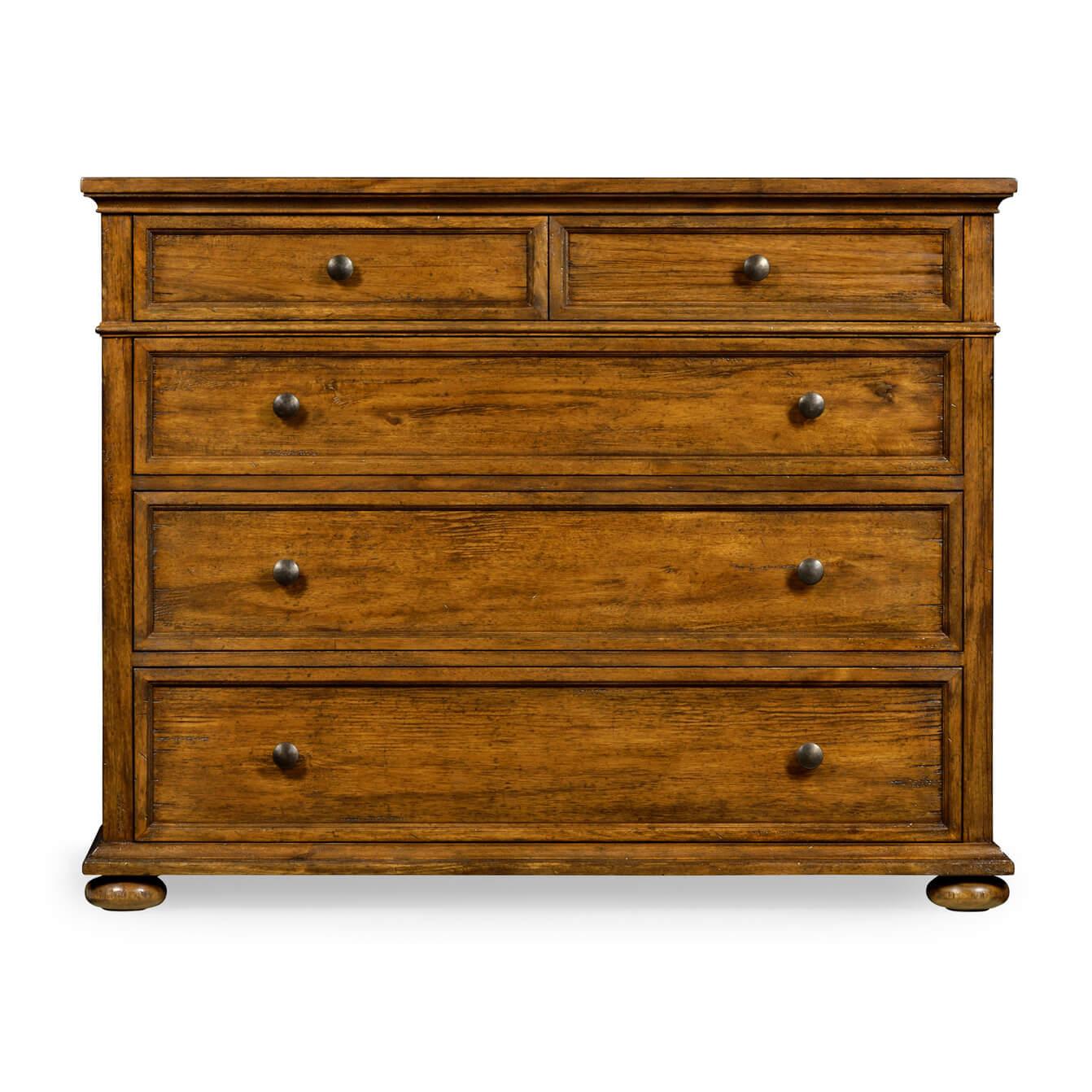 Large English Country walnut chest of drawers with two small top drawers and three large drawers, brass handles, and bunn feet.

Dimensions: 47.25
